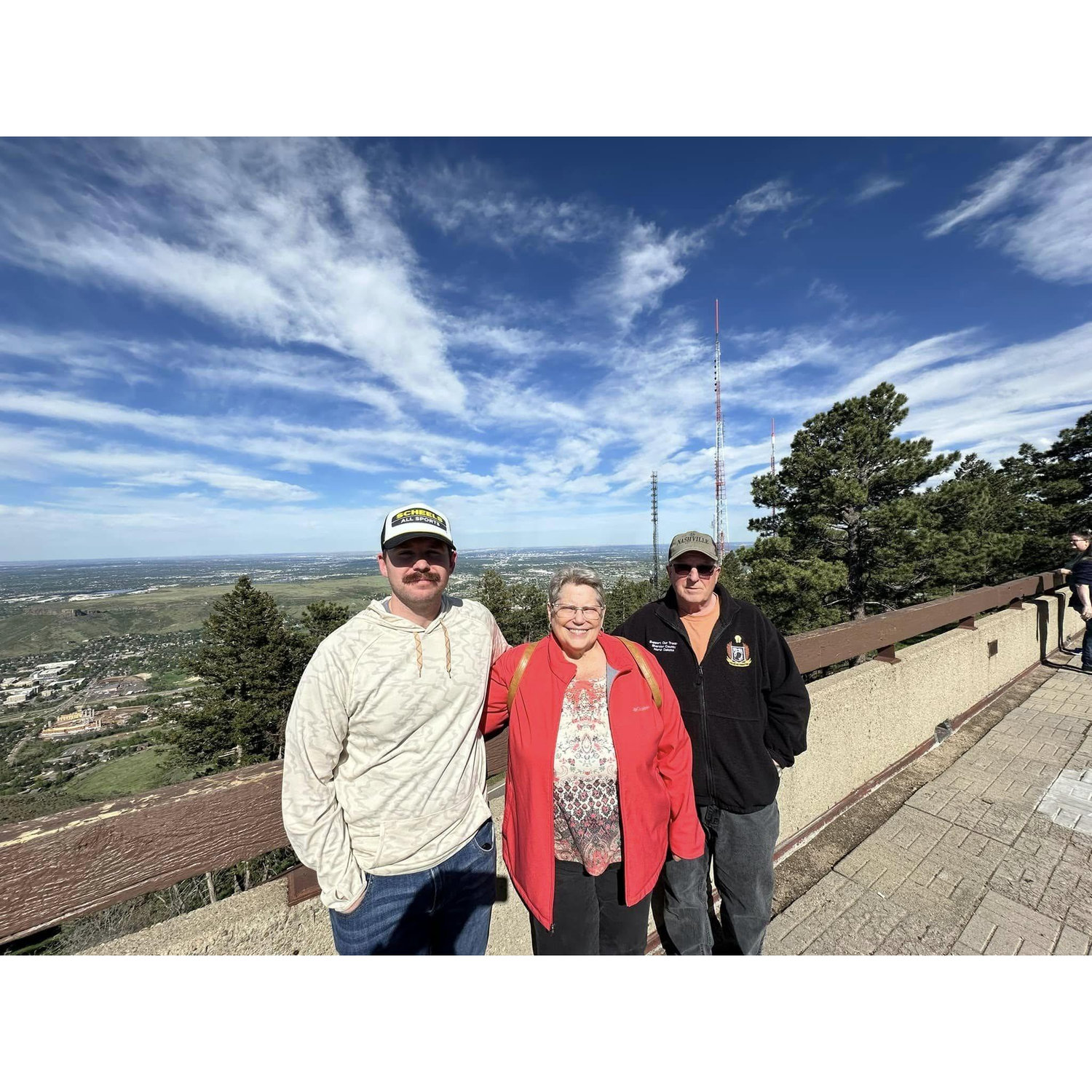 Ryan and his parents in Colorado