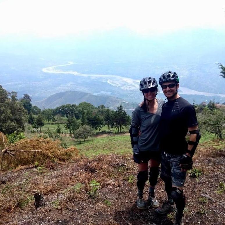 One of our favorite pictures of us together biking in Columbia in 2018. 6,000 feet of downhill biking through coffee farms with views like this...