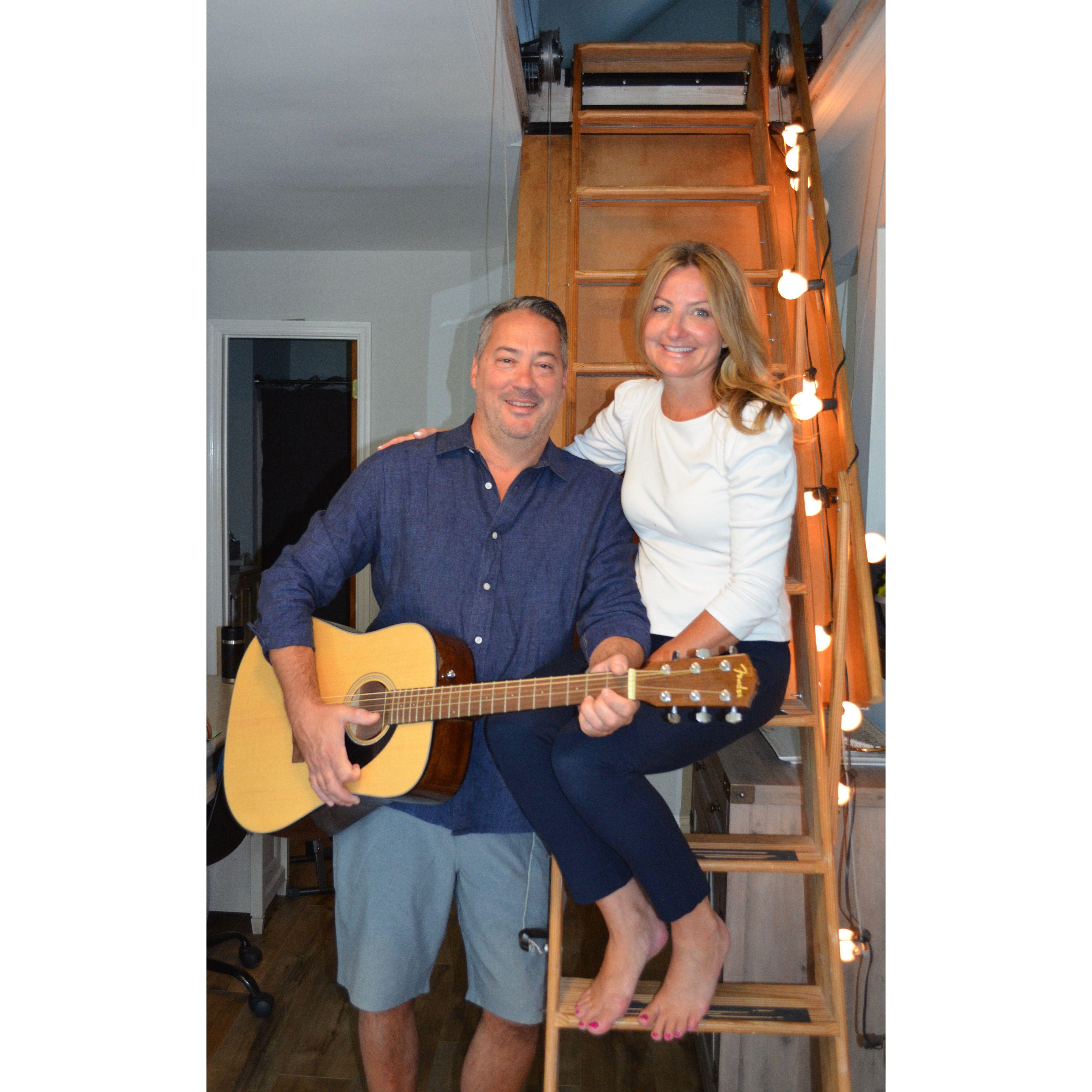 Strumming the new guitar and serenading this beautiful lady