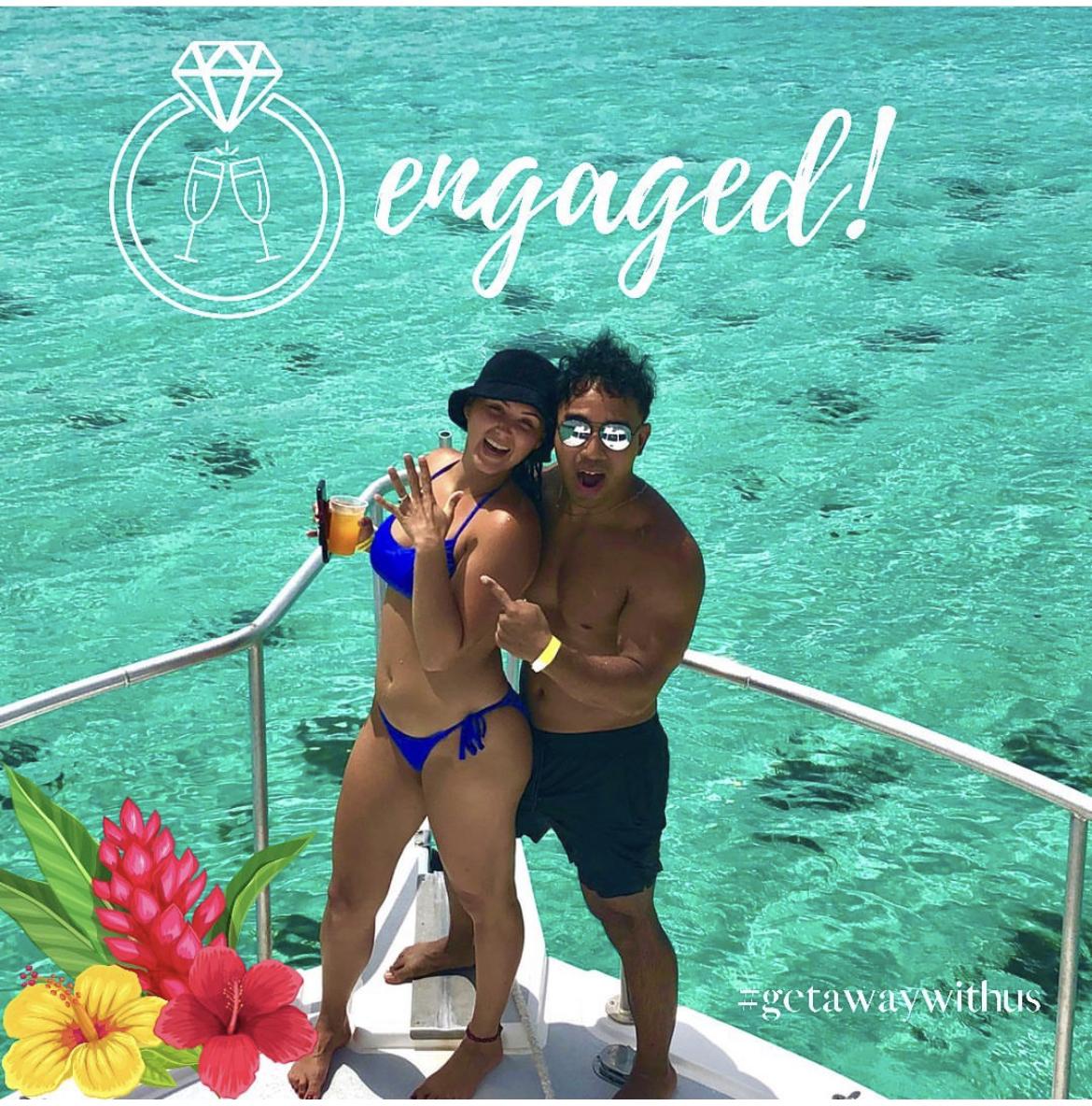 Captain of the boat took a pic of the newly engaged!