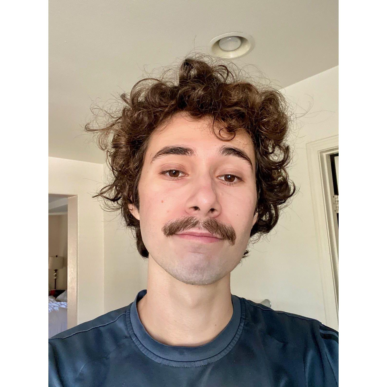 The first selfie Michael sent over. She may have been the only one, but Genesis was very into Michael's mustache (and continues to be).