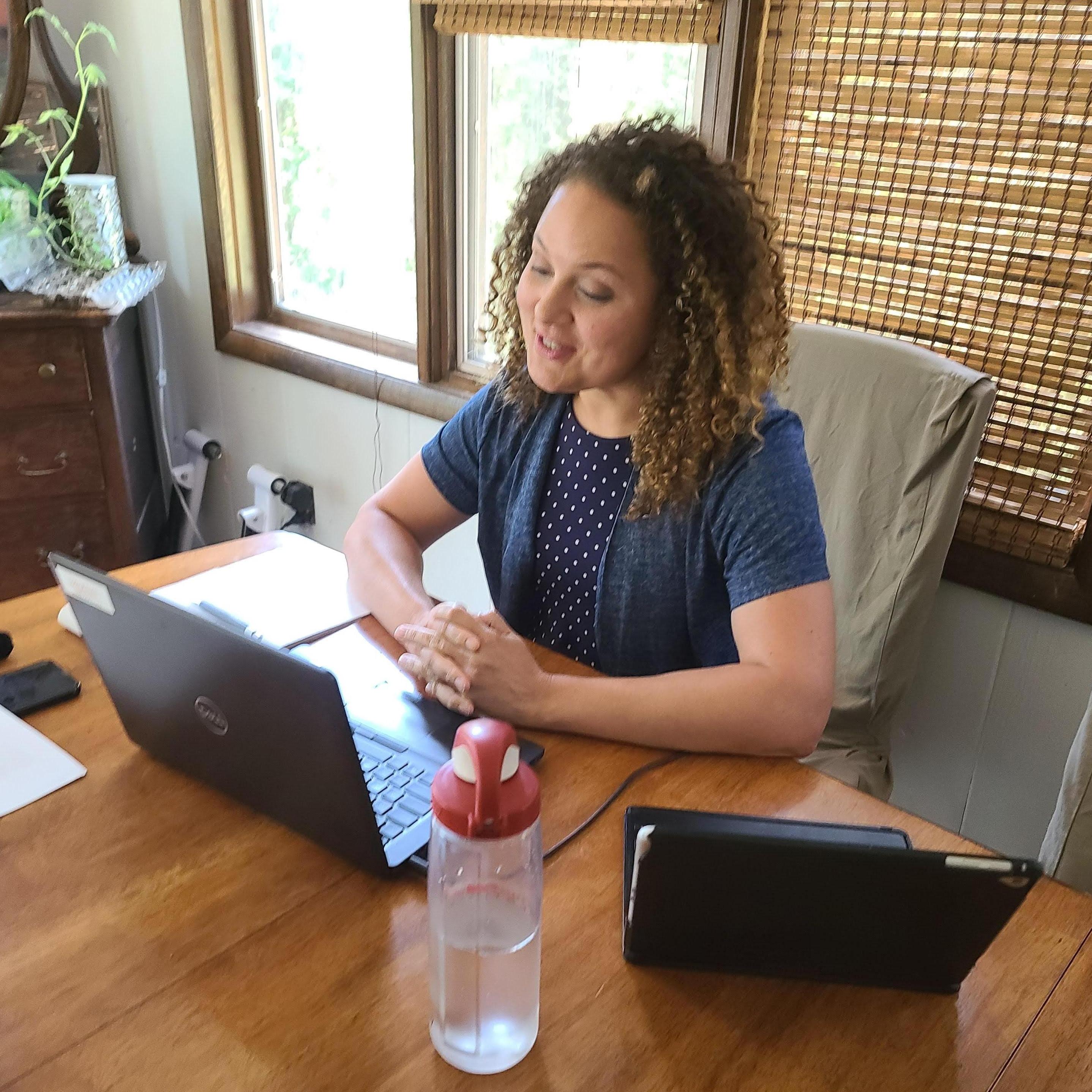 Hard at work!  Two laptops and two phones at once.