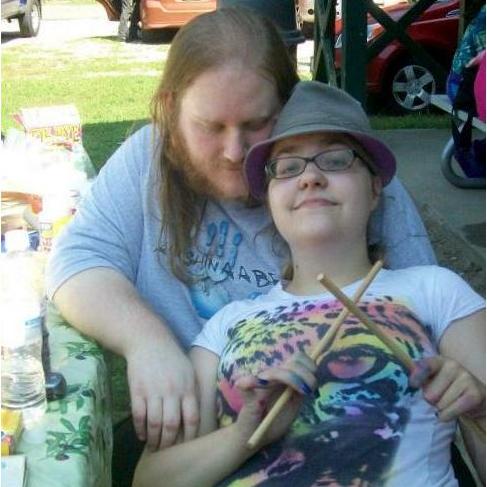 Relaxing at the arts and crafts table at a music festival in 2012