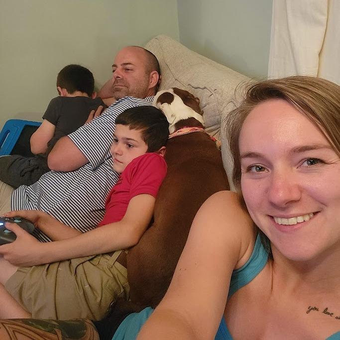 The whole family piled on the couch.