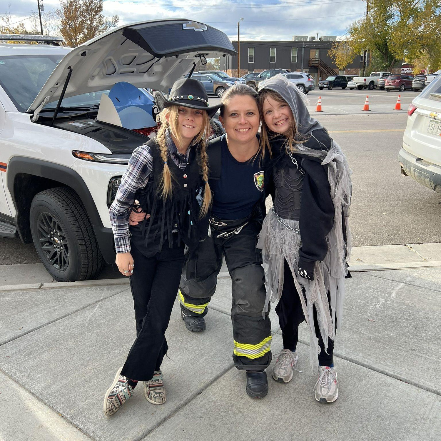 Elise, Kris & Railla at the Fire Station on Halloween.