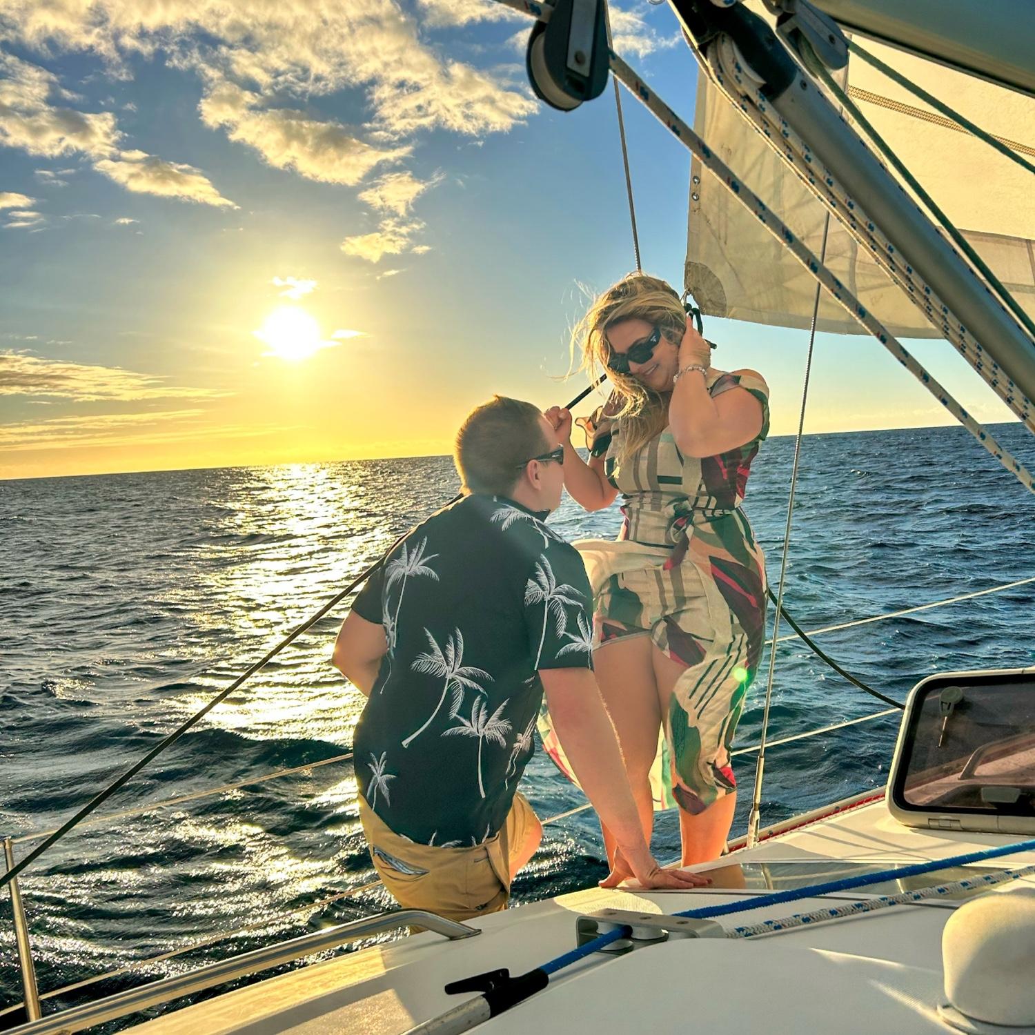 Jon proposing to Alana in Kailua-Kona, Hawaii New Years Eve 2023.