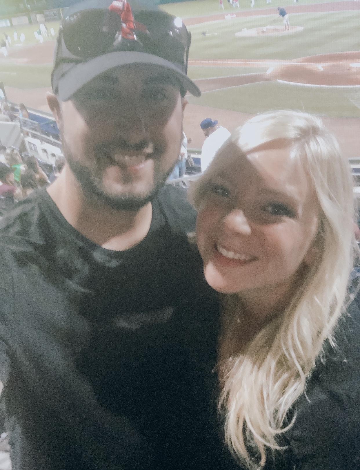 Our first picture together and first baseball game