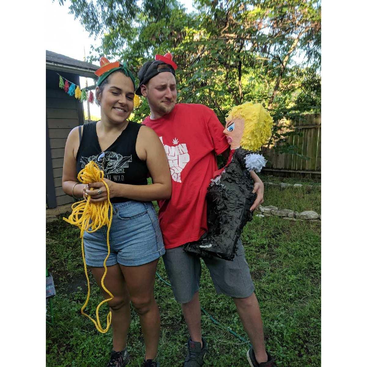 Celebrating Cinco De Mayo with a crawfish boil and a Trump pinata.