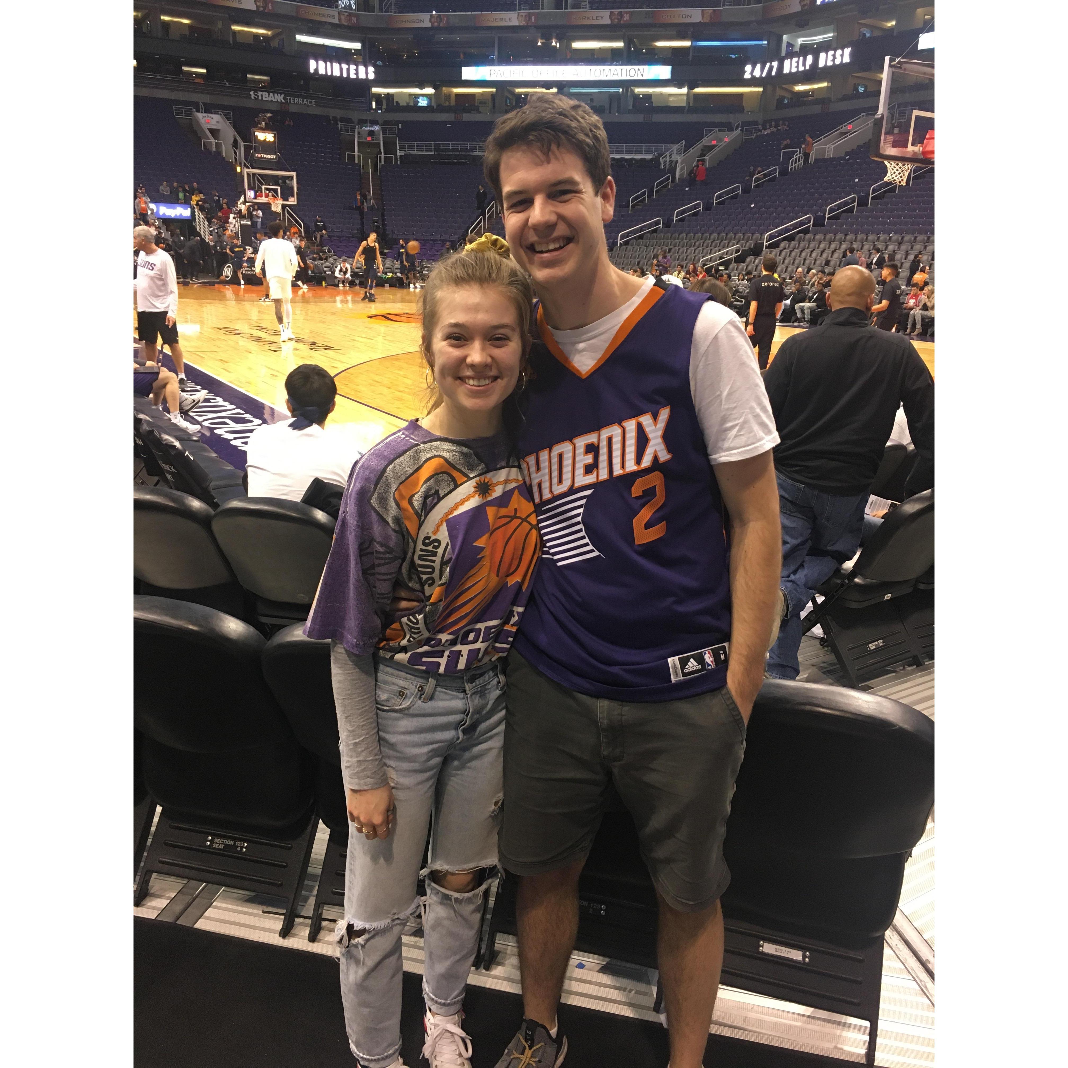 At a Phoenix Suns game! Hope we can go again someday!