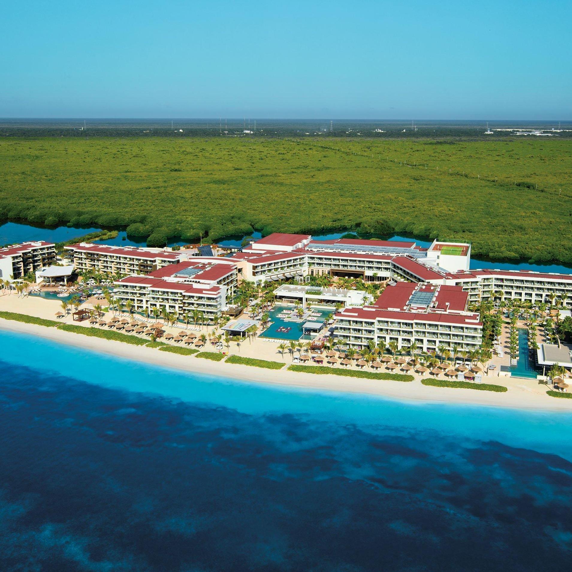 The resort has THREE full and separate sections; the left is the Secrets side (calm), the middle is the Energy side (main pool), and the right is the Xcelerate side (party pool).