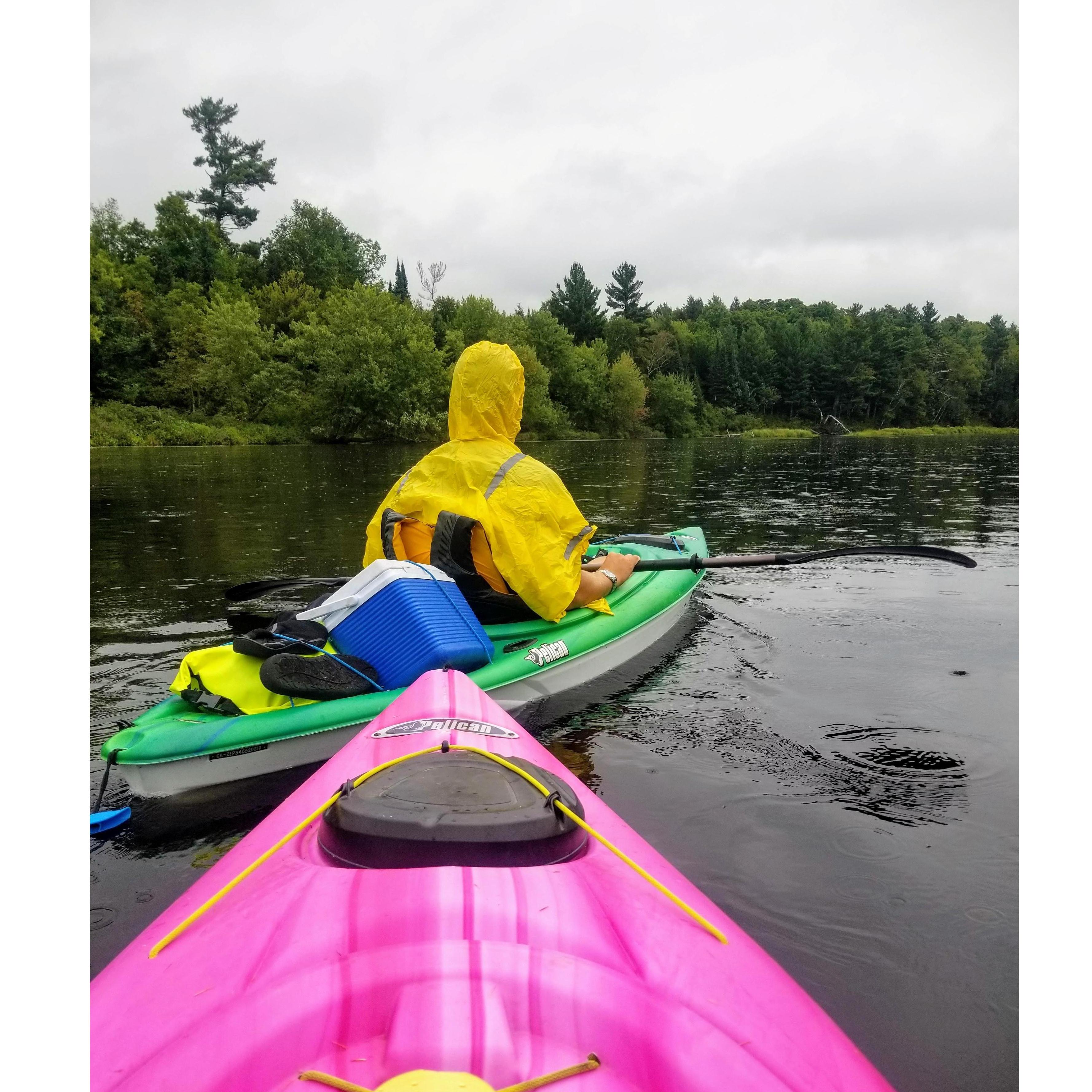 Kayaking in the rain after the proposal