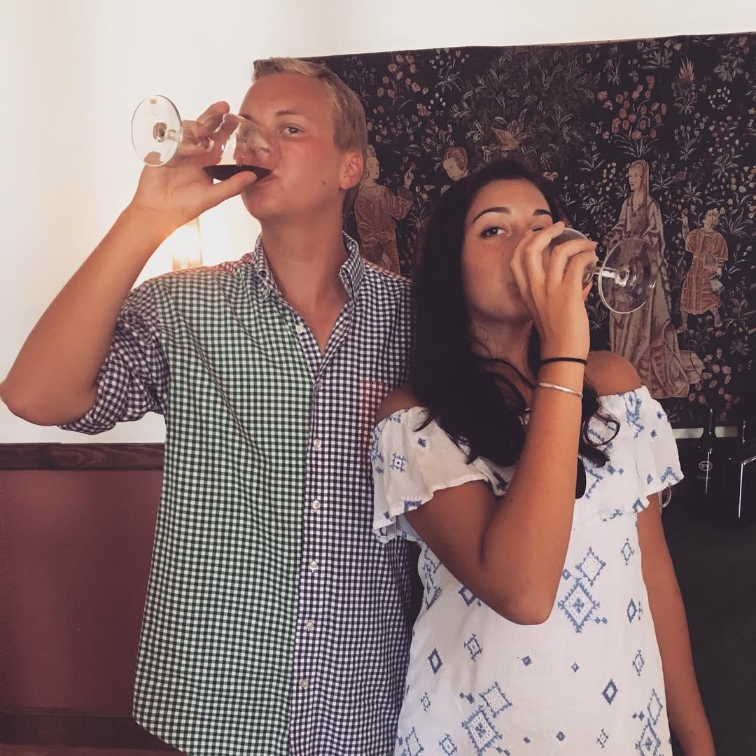 Chandler took Emily to the Williamsburg Winery for one of their first dates. Who's more tan? They had many debates this day over who was the tannest. -2017