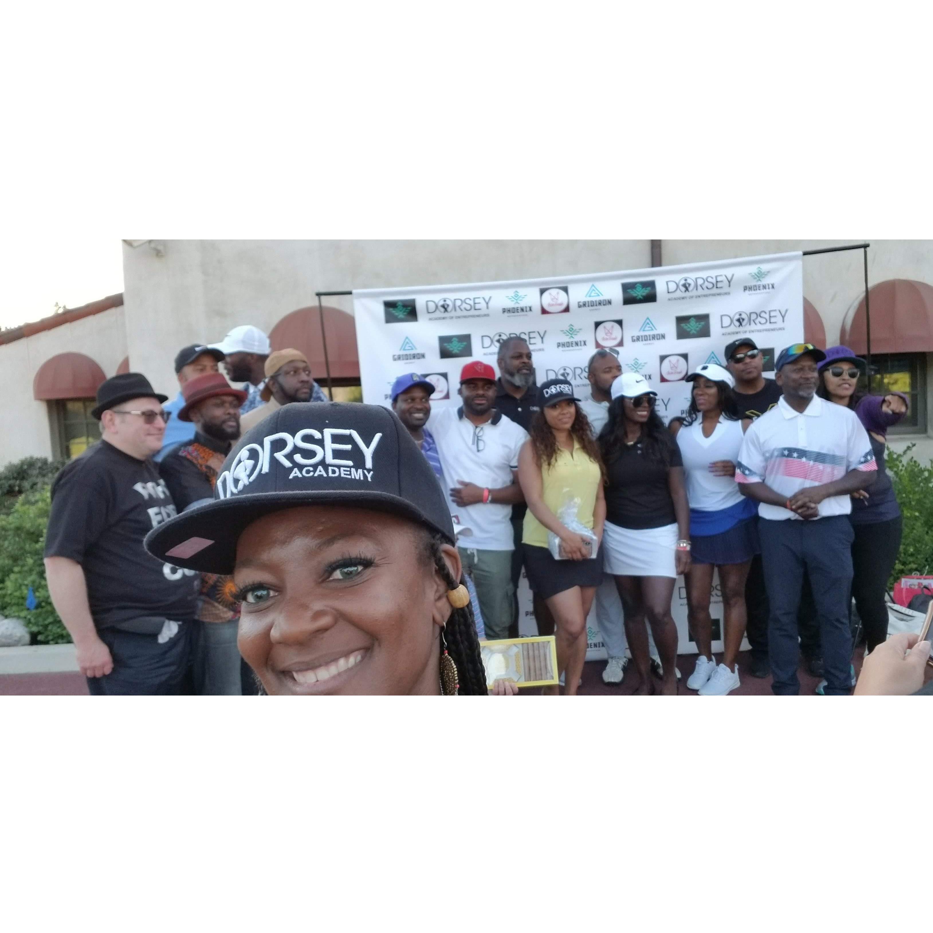 Enchantee supporting Norris at a Dorsey Academy of Entrepreneurs Golfing for Families fundraiser (2019)