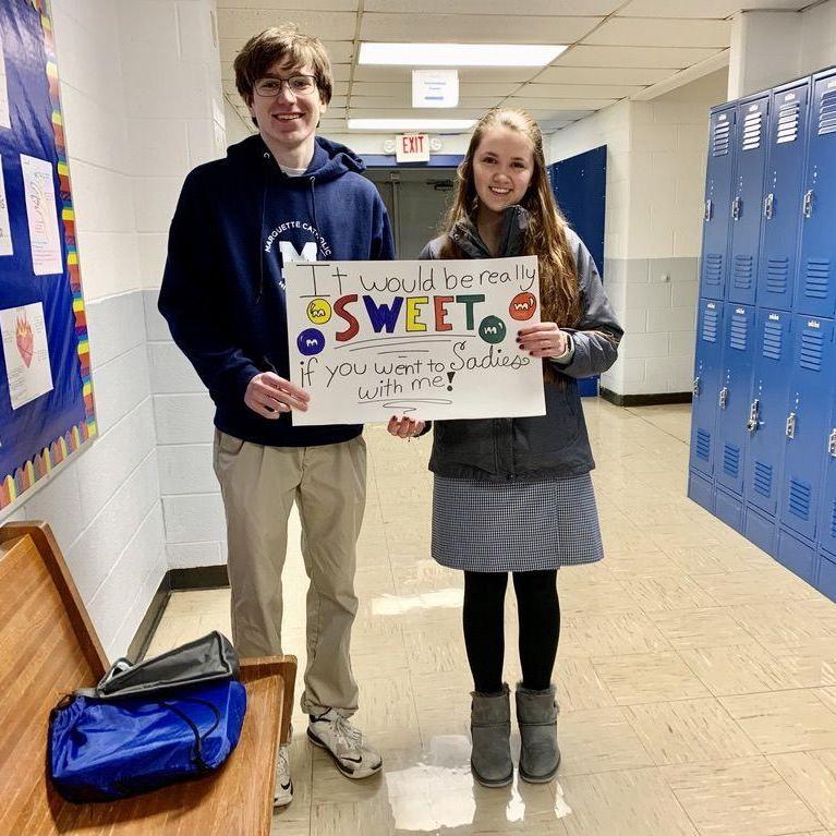 Alaina asking John to go to the Sadie Hawkins Dance