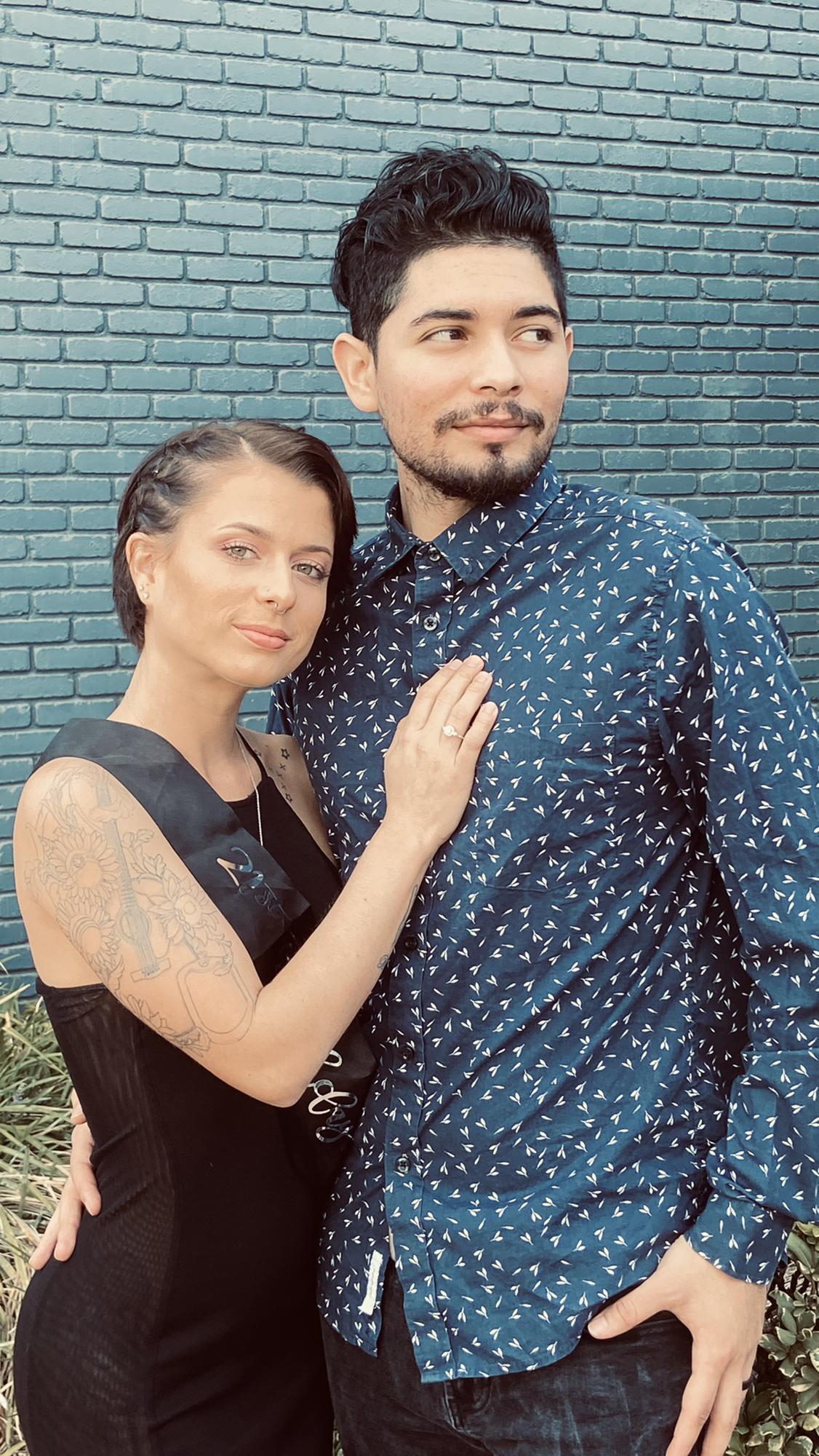 The couple at the engagement party.