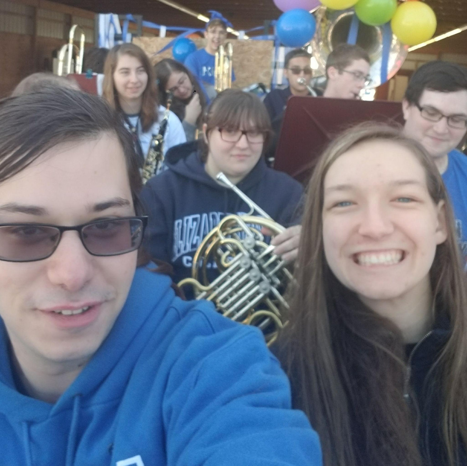 If you made it this far down, congrats! This is the earliest photo of us we have, long before we started dating, when we both played in our college's homecoming band in October 2017.