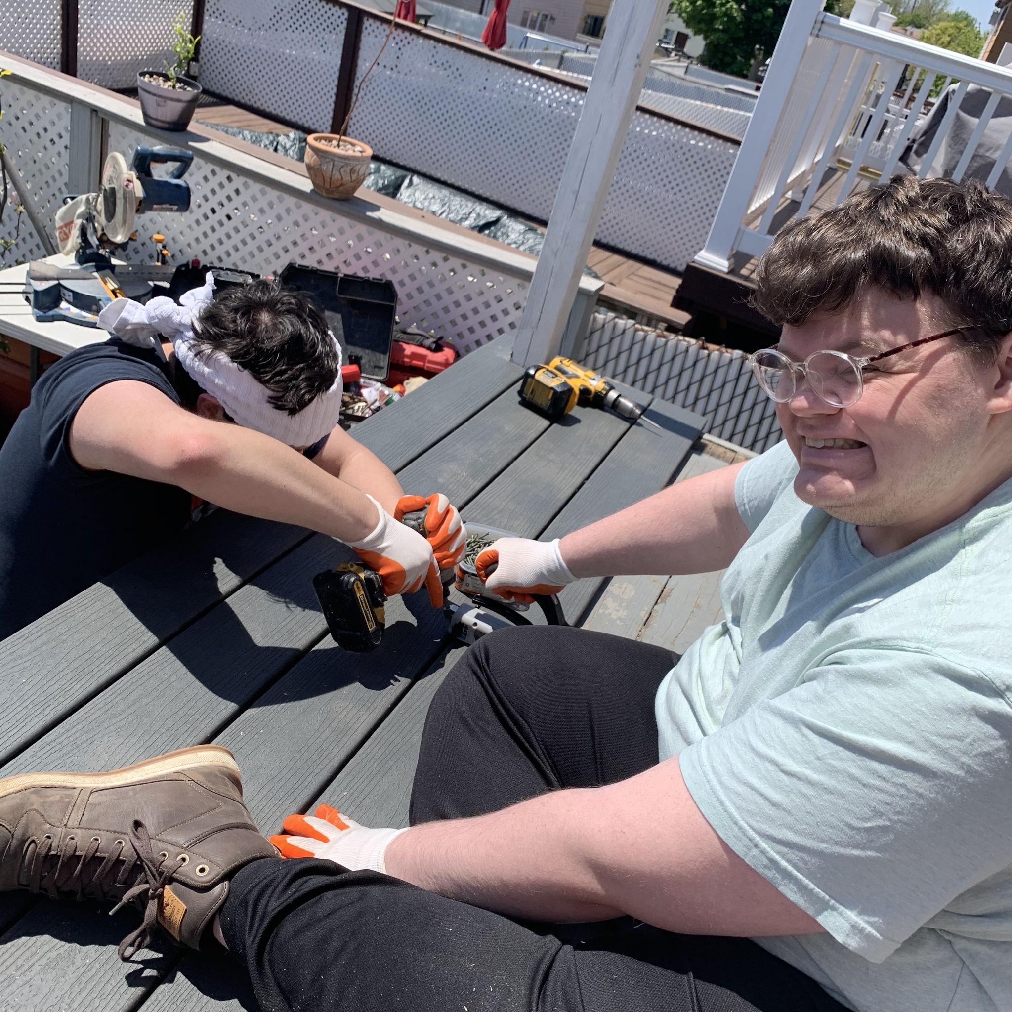 Ralphie and Matt working hard on the deck. Da was in a chair delegating. He is the Foreman after all.