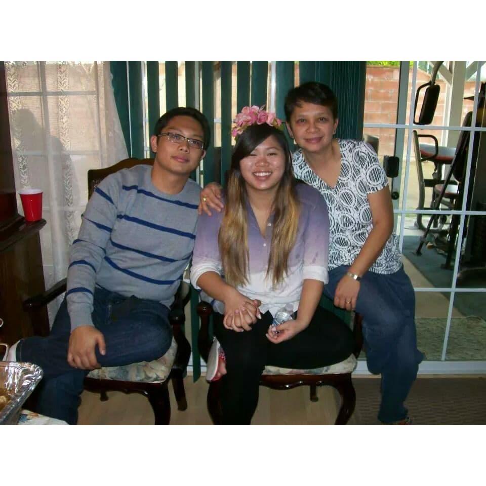Jan, Kalia, and Cris at a family gathering. This was one of their first photos together!