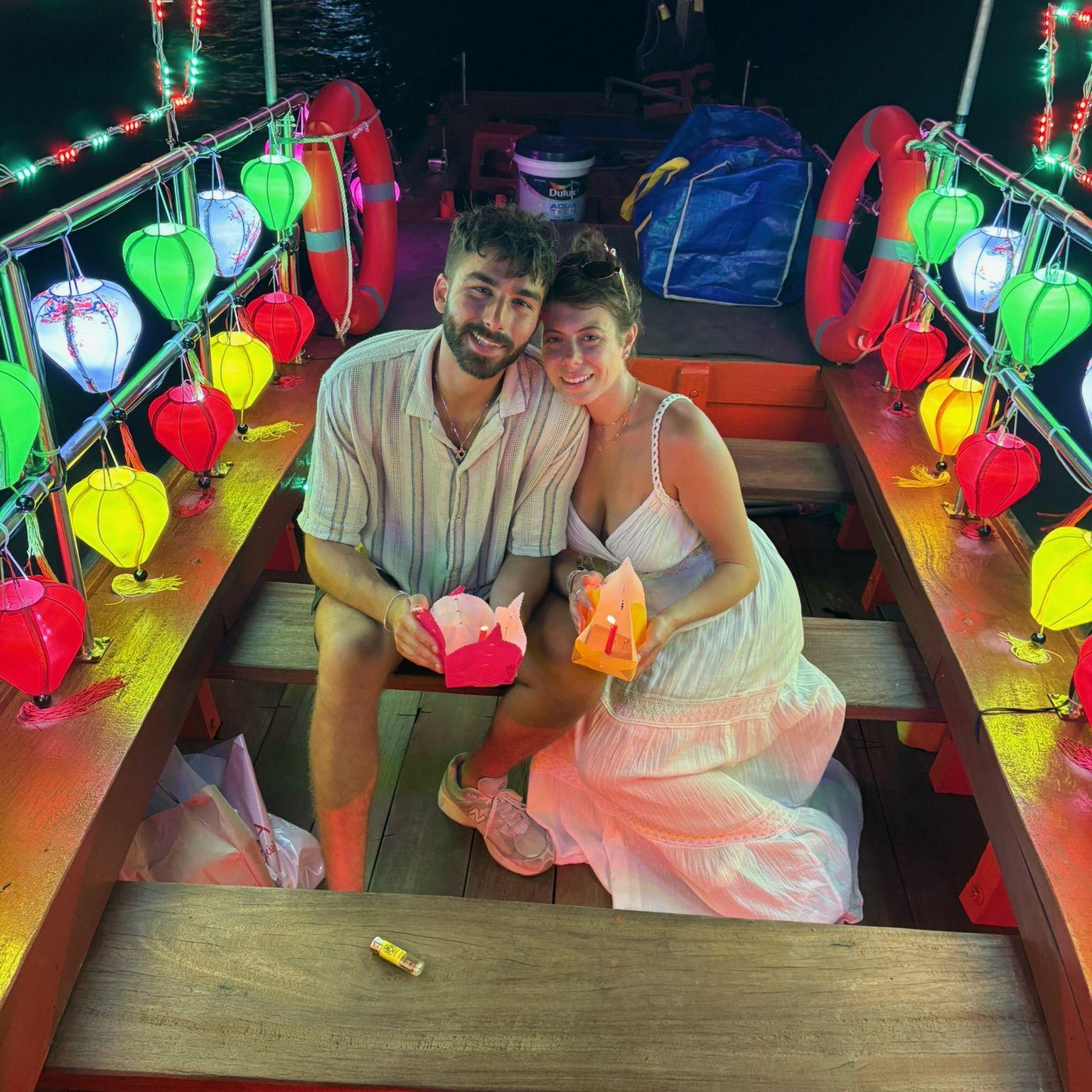 Letting out our lanterns in Hoi An, Vietnam for luck, happiness and prosperity