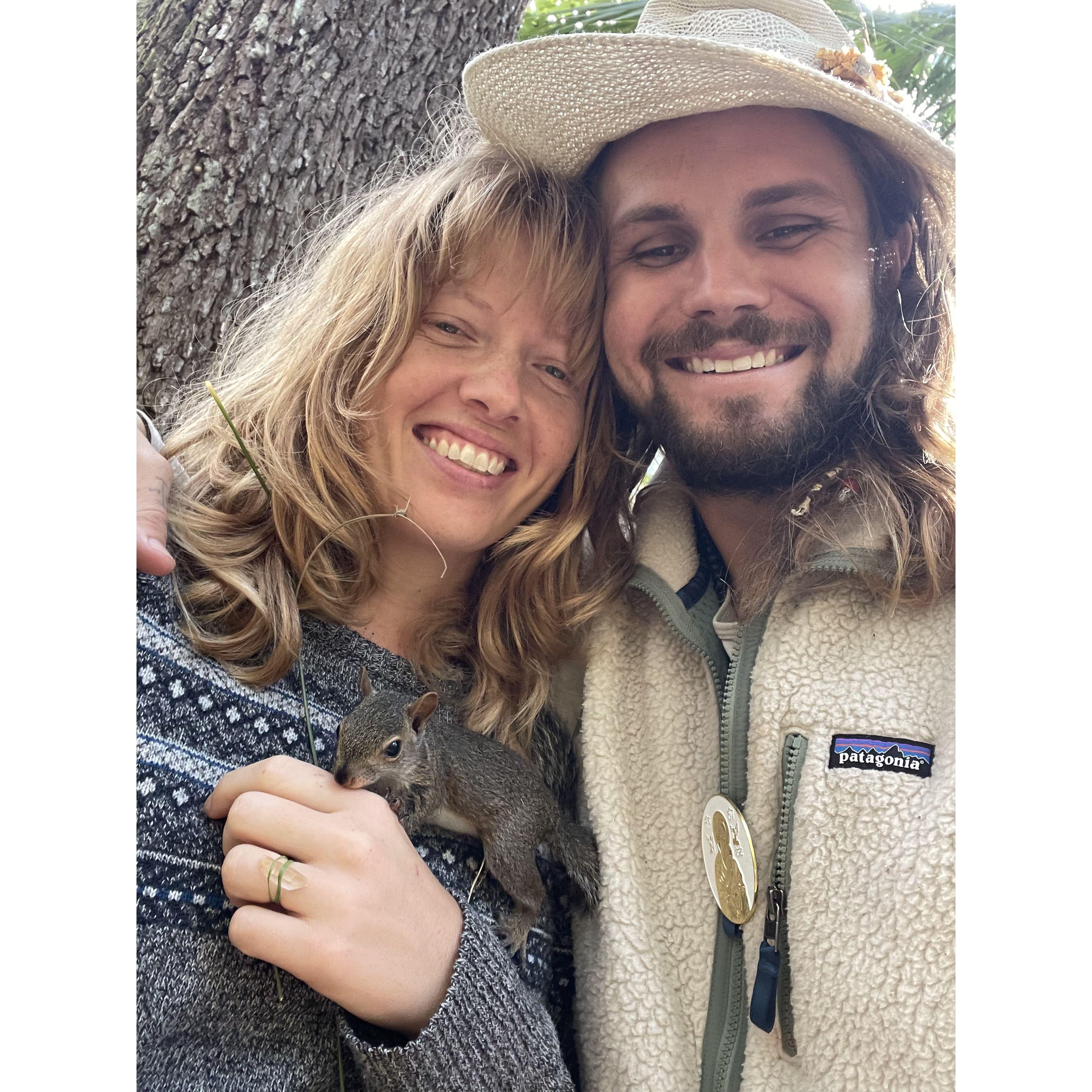 We got engaged under our favorite tree with our rescue squirrel, Cashew.