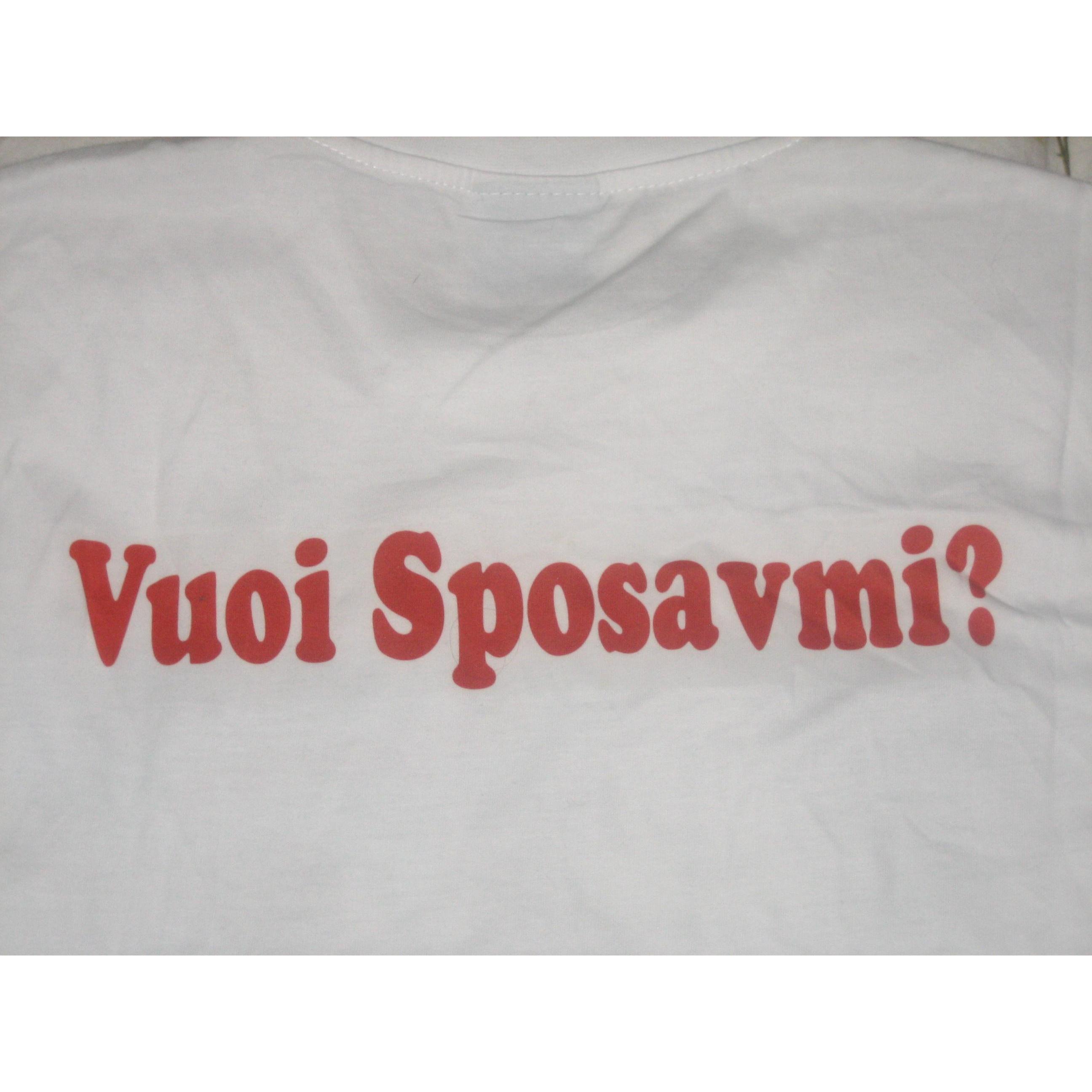 The t-shirt George created in order to ask me for marriage...I (Clementina) just could not stop laughing with the sweet error on the word sposarmi :) February 2007