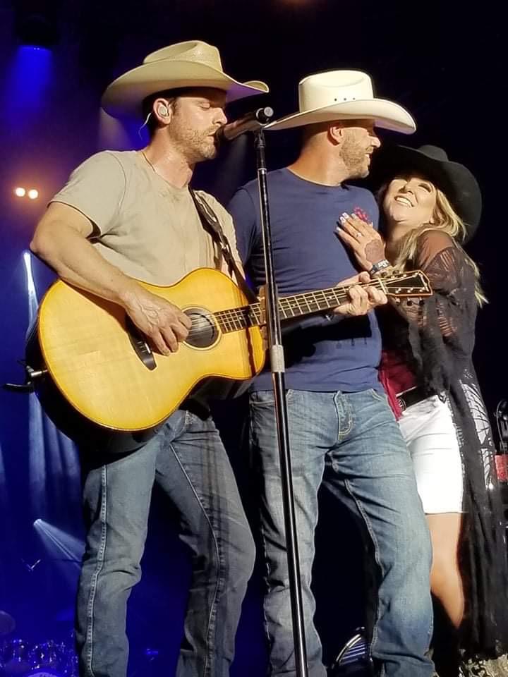 The night Mark proposed we got to dance on stage with Dustin Lynch while he sang "Cowboys and Angels"