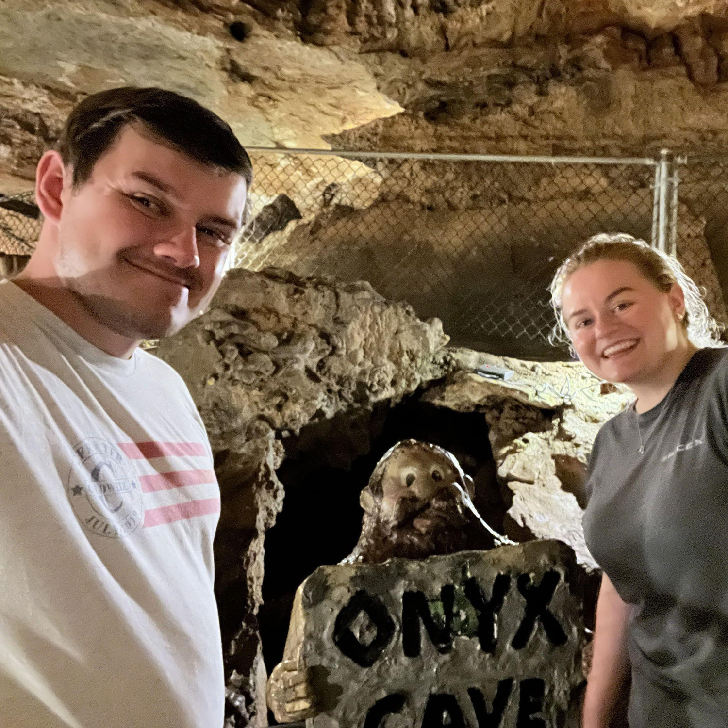 Keeley and Jake exploring a cave.