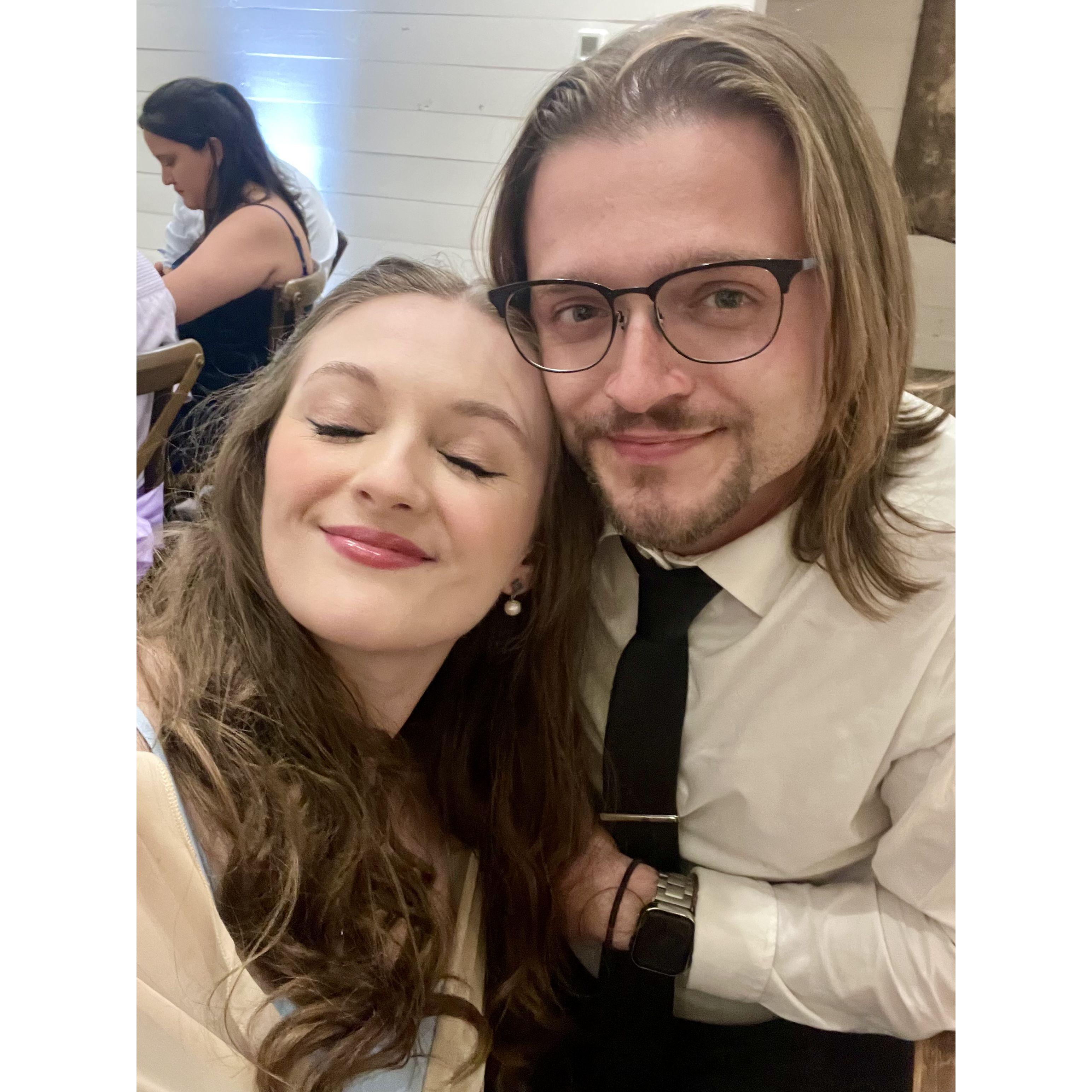 September 2024 - us at another friend's wedding, where Cassidy wonders when that will be us, not knowing Denver already has a ring and a plan 💍
