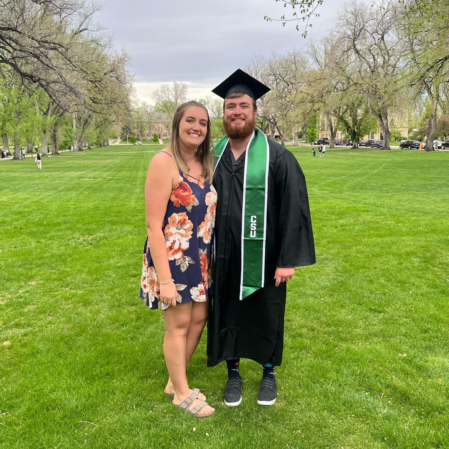 Us at Logan's graduation from CSU in 2022!
