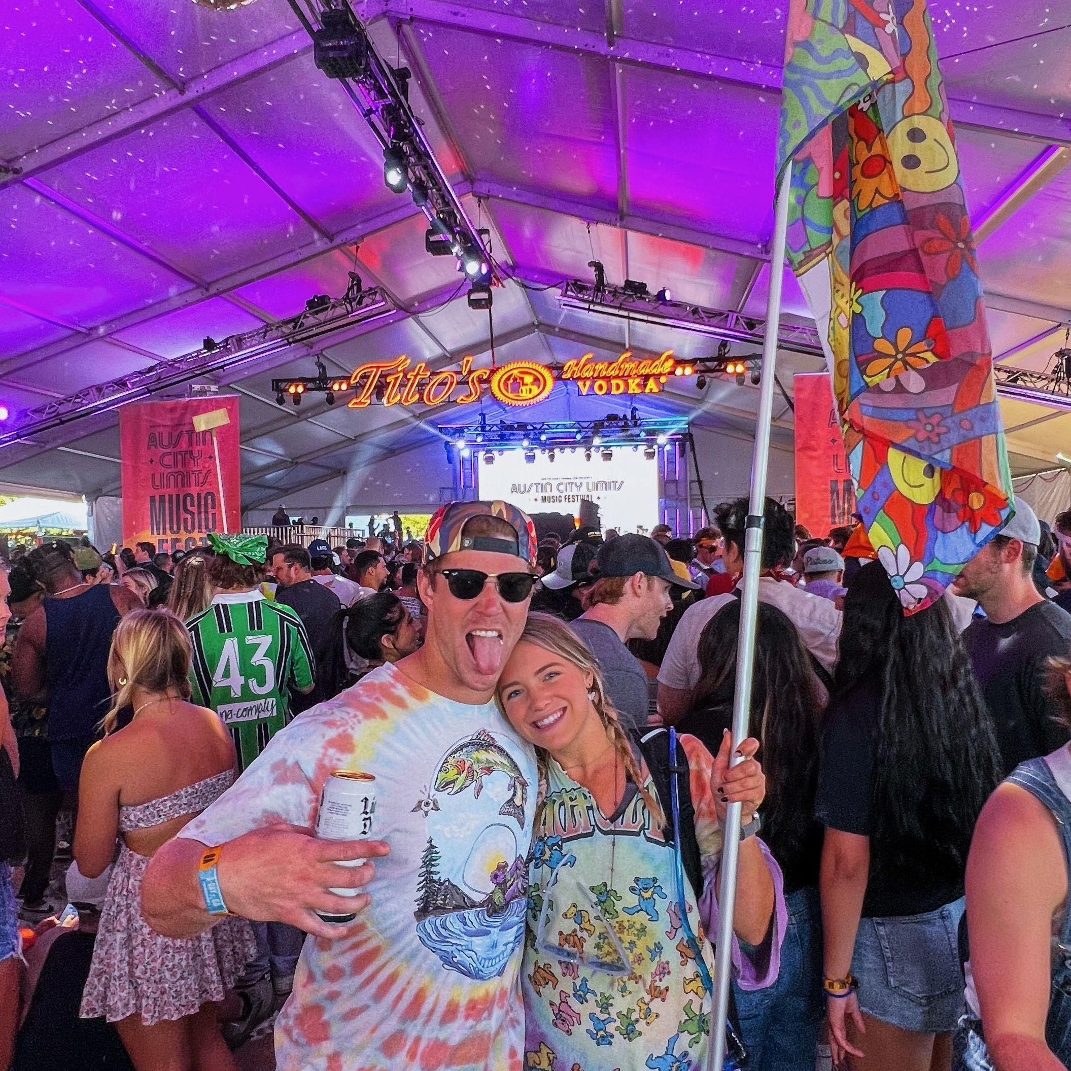 Every year at Austin City Limits, Brooke and Brooks have a flag to gather their friends together at each concert. It is one of their favorite weekends of the year!
