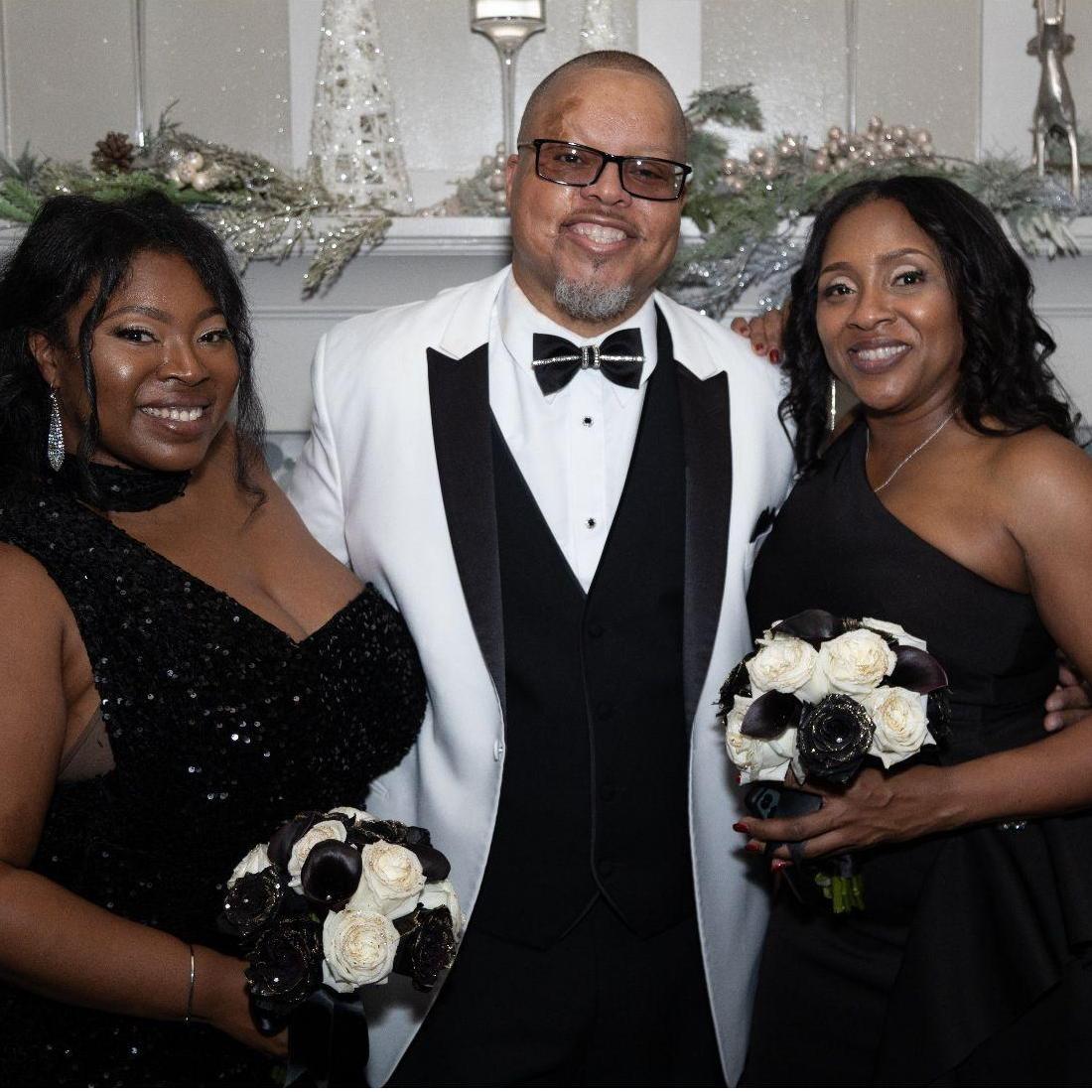 The Groom with his daughter-in-law and sister-in-law.