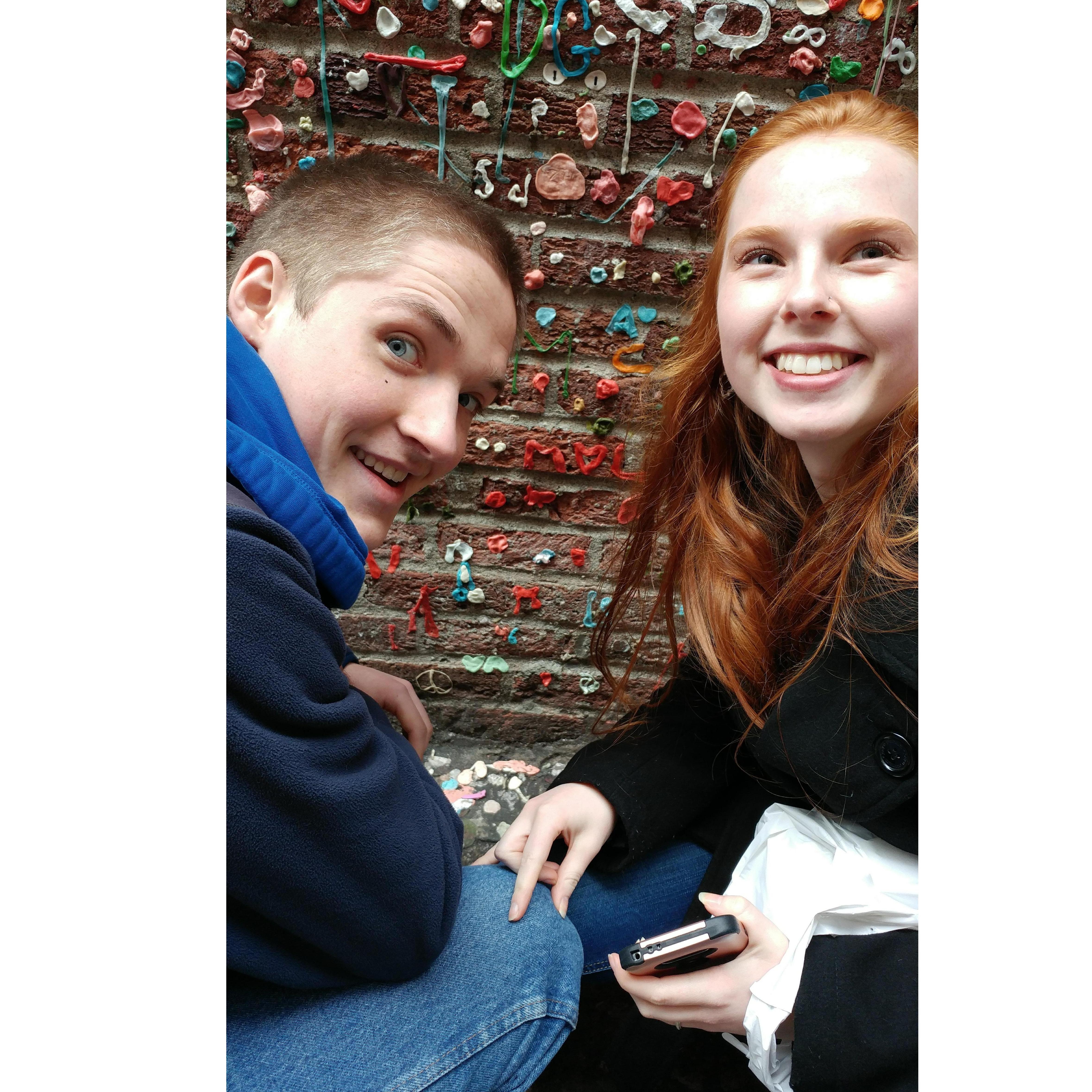 The two of us next to the Gum Wall in downtown Seattle, 6 months in.
