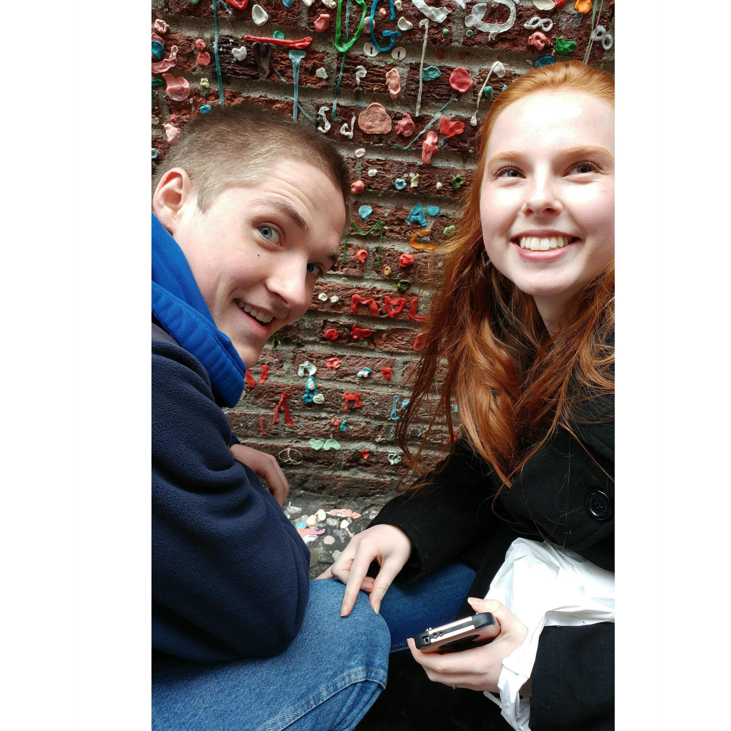 The two of us next to the Gum Wall in downtown Seattle, 6 months in.