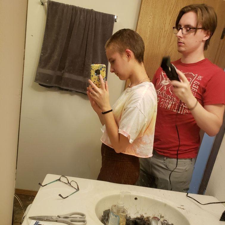 Skyler helping Kelley shave her head. No better time to buzz all your hair off than quarantine - Fall 2020