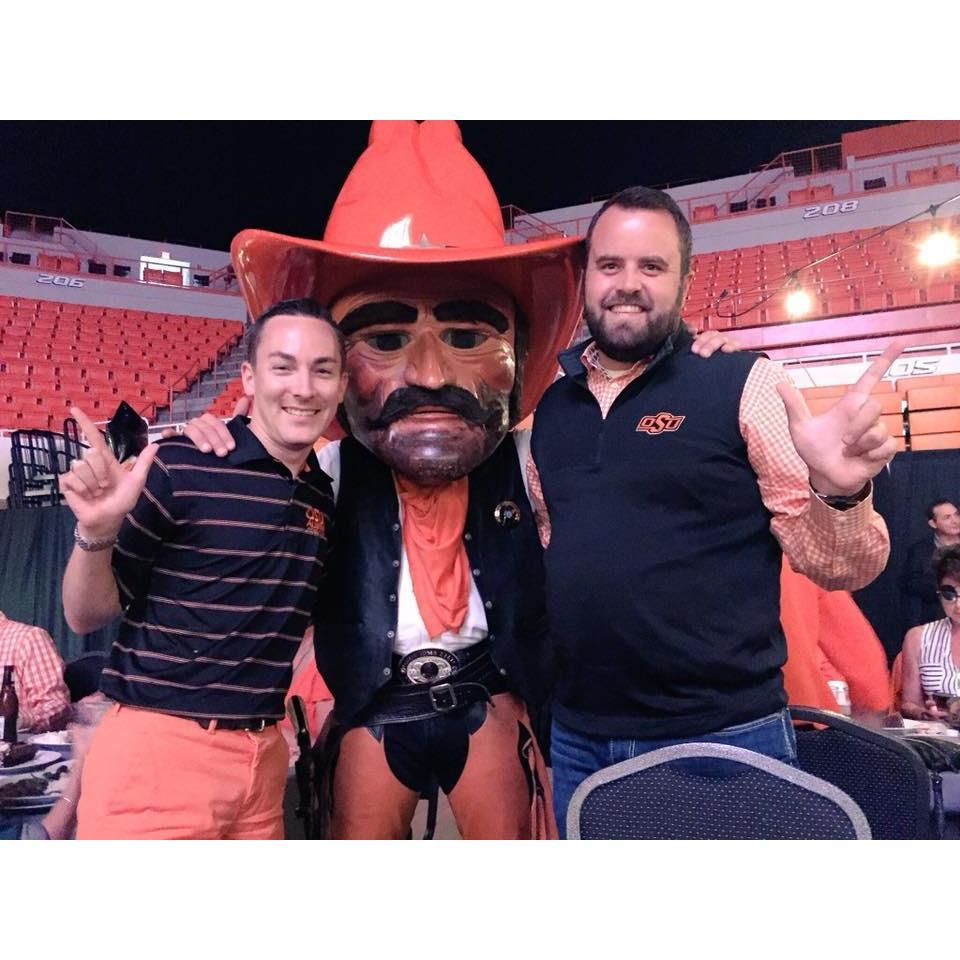 It's not hard to find pictures of us with Pistol Pete! We can be found at most OSU Athletics events in Stillwater and also enjoy following the Pokes on the road!