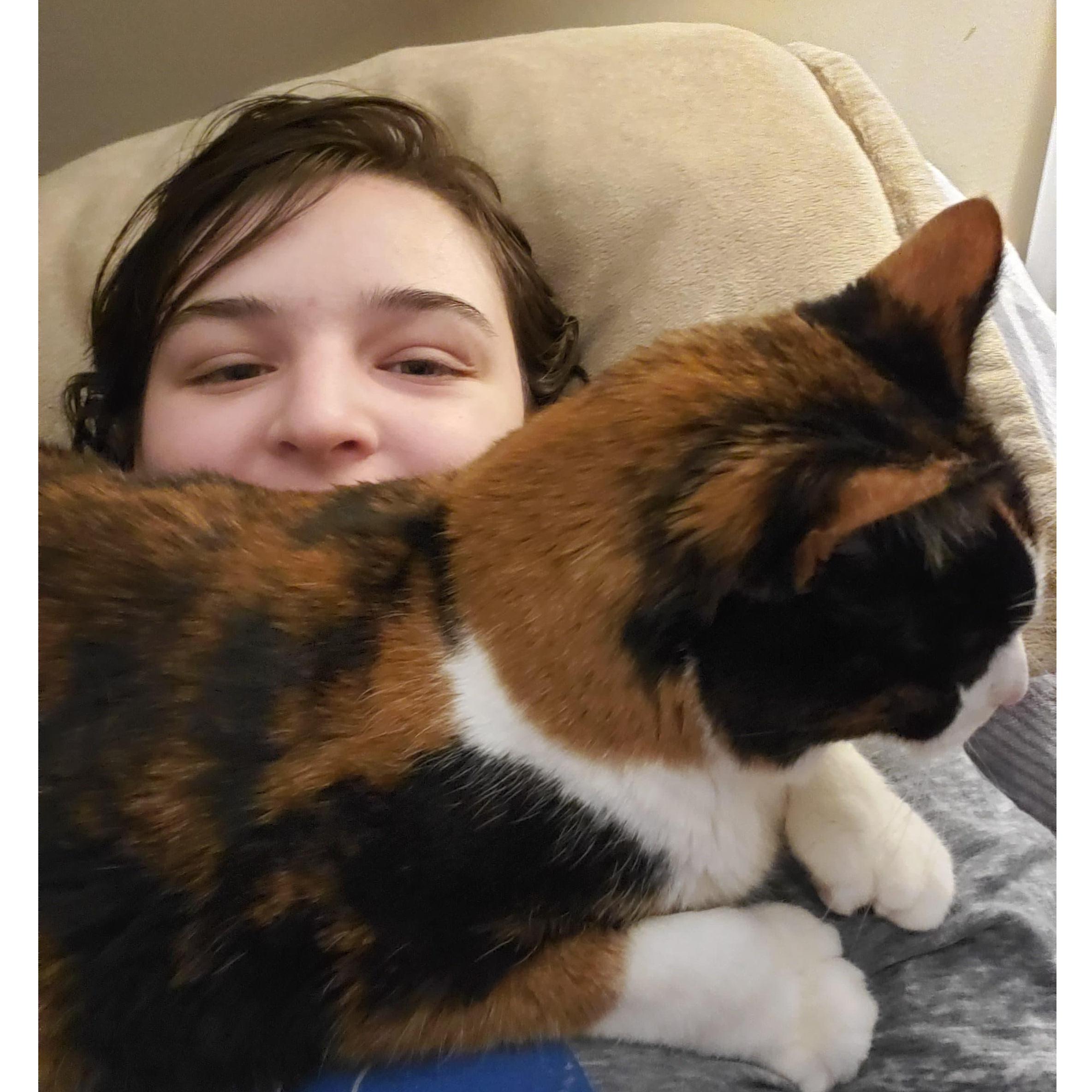 Sadie makes sure her humans gets plenty of cuddle time