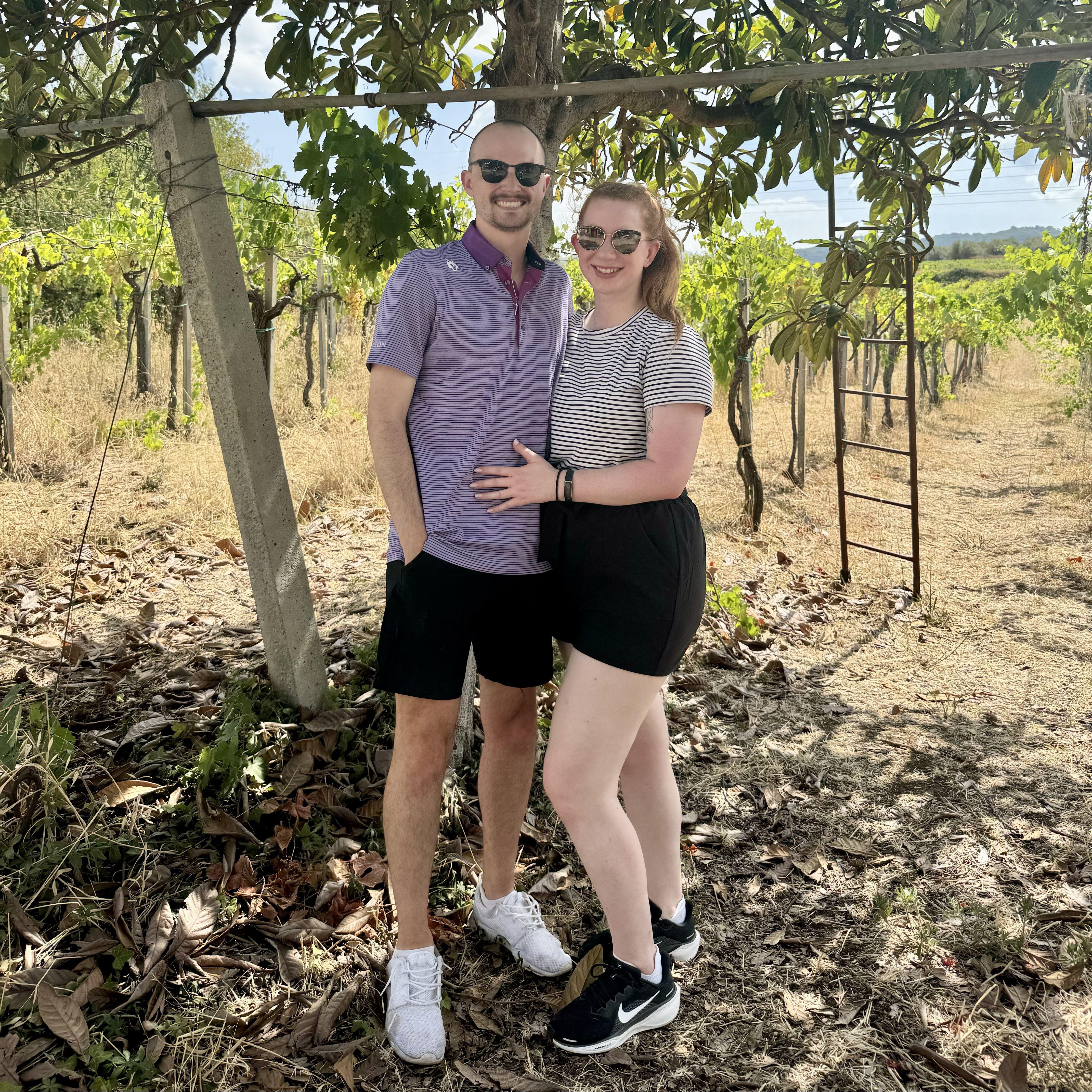 Exploring a vineyard in Frascati, Italy. We got to sample grapes and wines. Taken the day before we got engaged! 8.18.2024