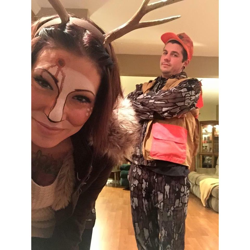 A hunter with his deer