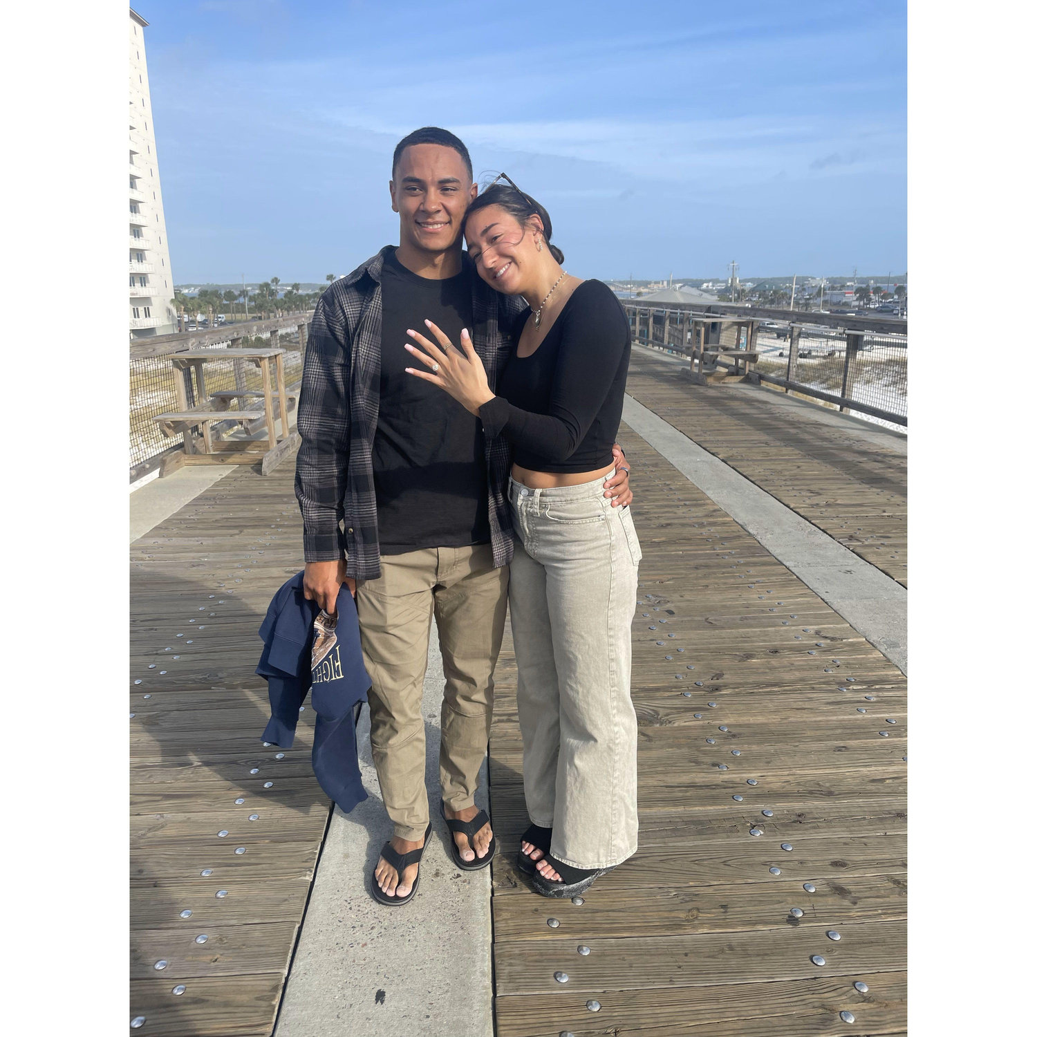 Avery showing off her ring after the proposal