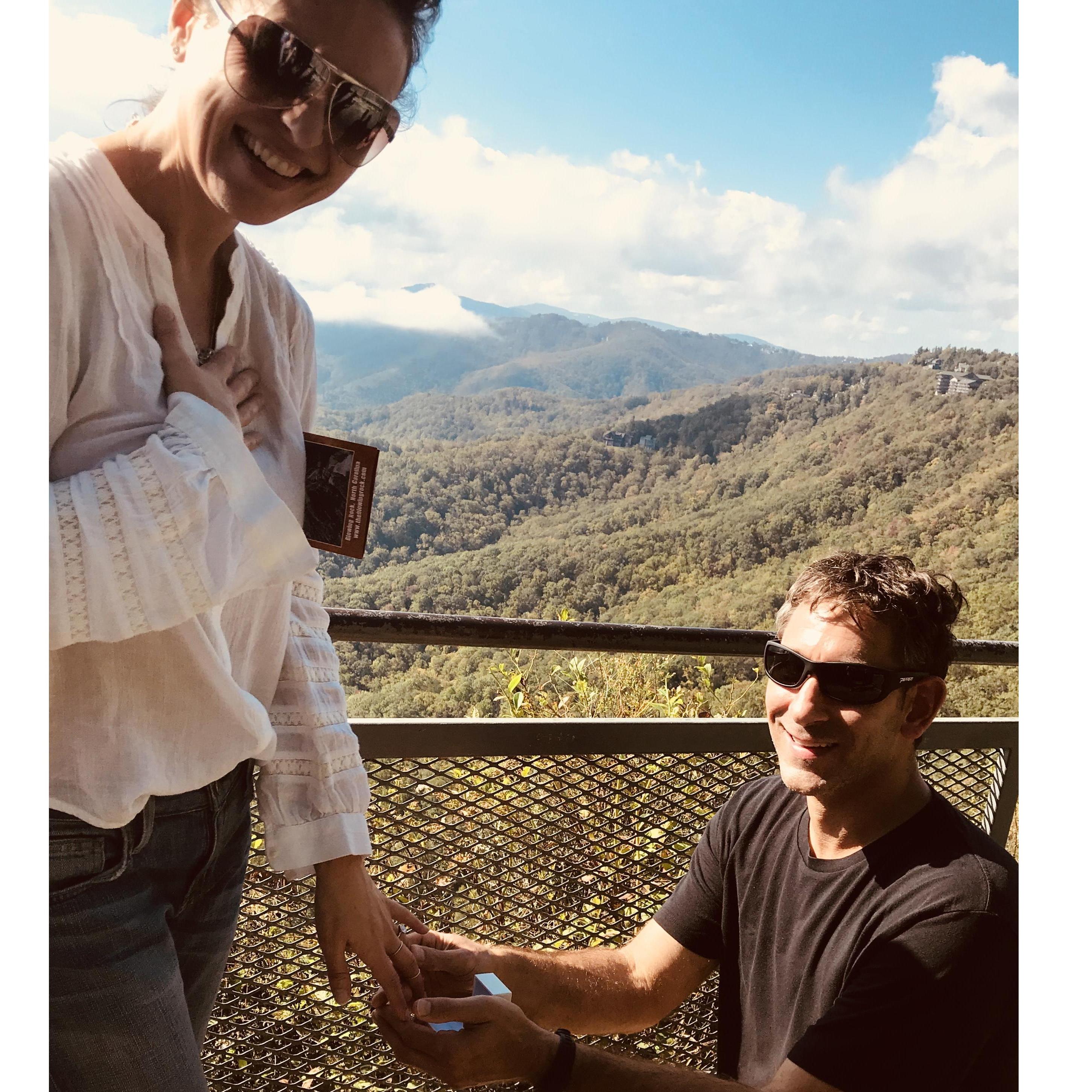 He had actually already proposed, but some strangers found us and insisted we reenact the moment so that they could take pictures for us.  So sweet!