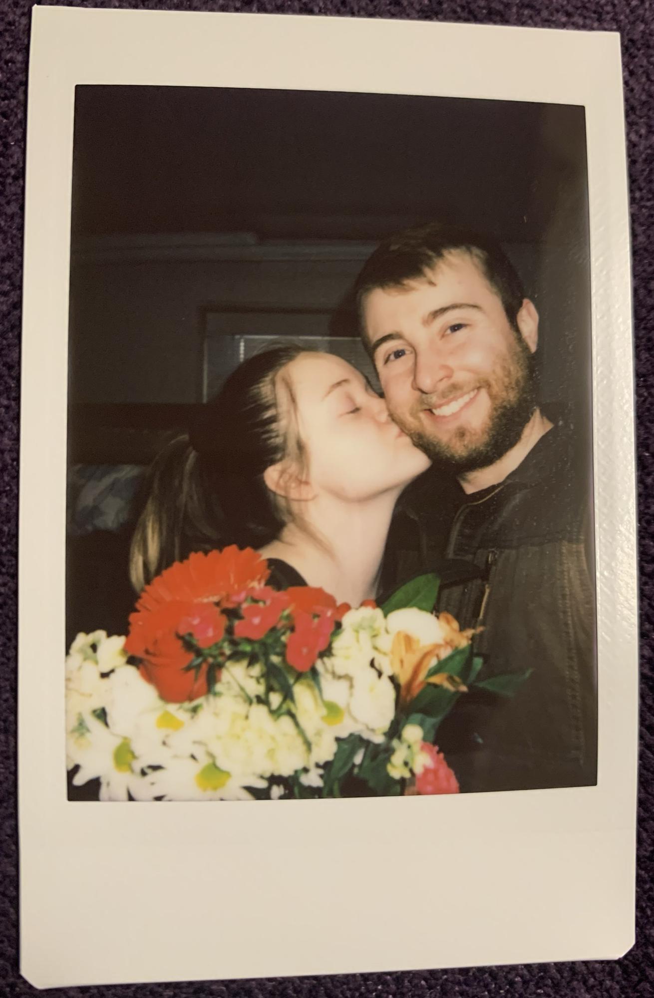 We take a polaroid picture every month. It all started when we officially started dating on the same day we happened to take pictures on the polaroid for fun. This photo is of our 1 year anniversary.