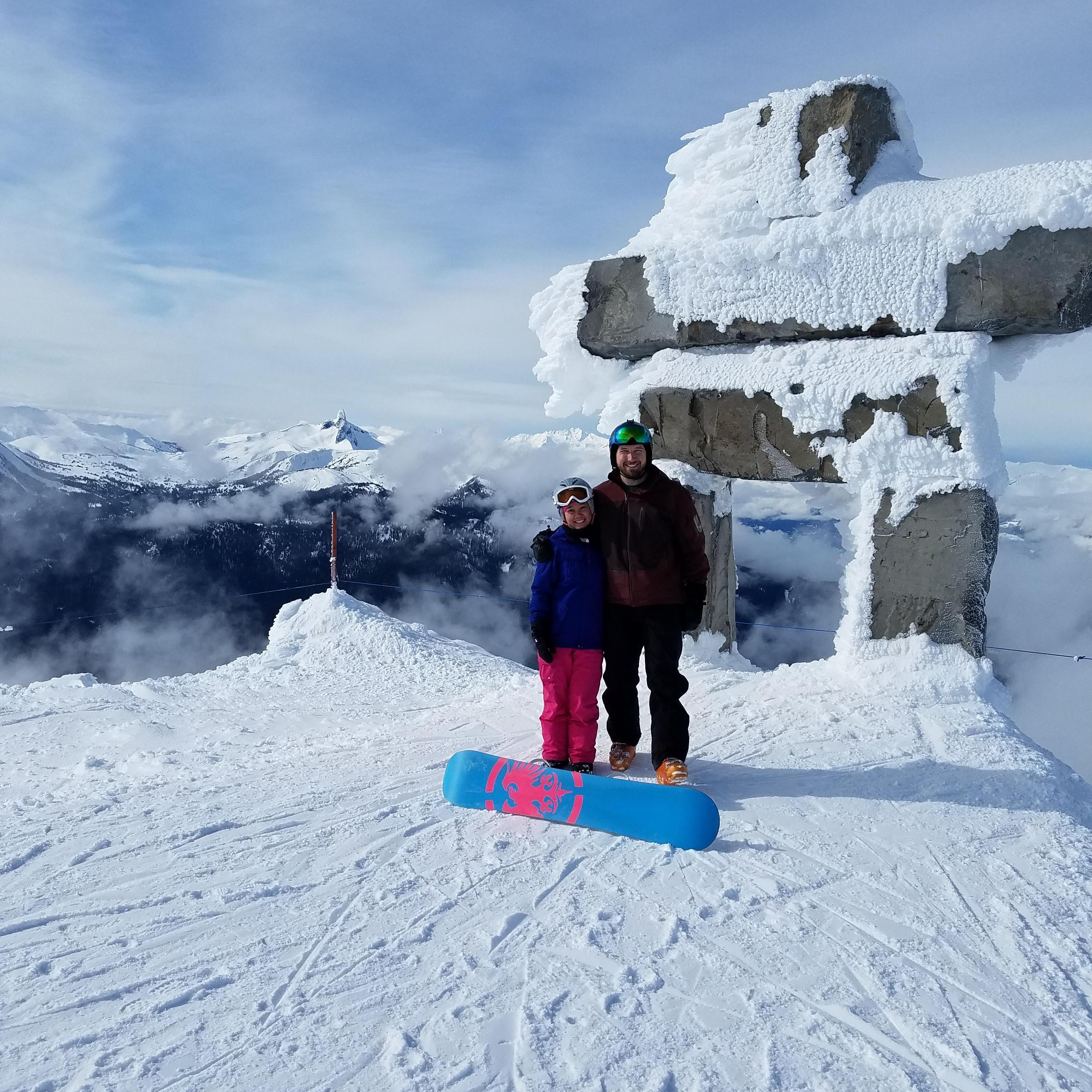 Posing in front of the Inukshuk at Whistler with Black Tusk in the background