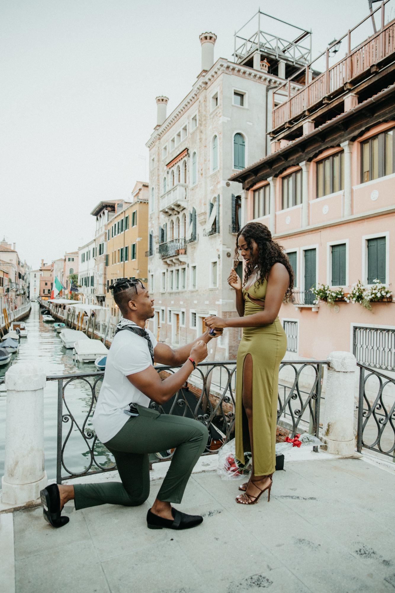 FUN FACT: Emmanuel had to get down on one knee twice. Lois was so shocked that she initially thought he was playing a joke on her. So, it took him taking the flowers out of her hands & doing it again.