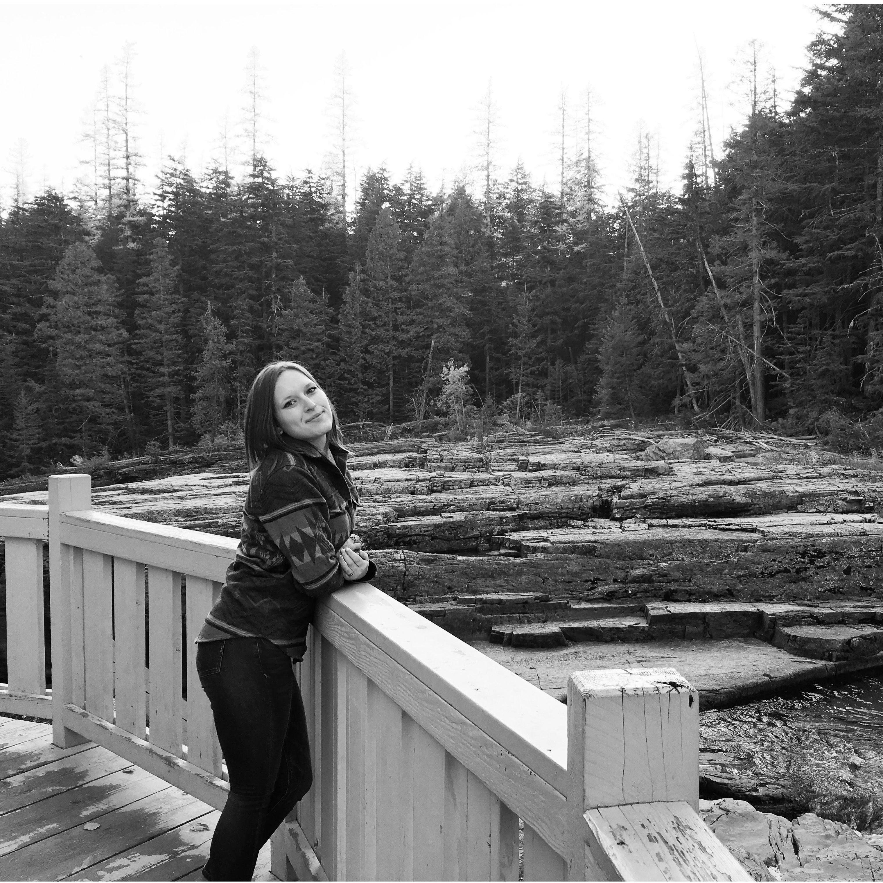 Aurora stealing Sean's jacket at Glacier National Park
