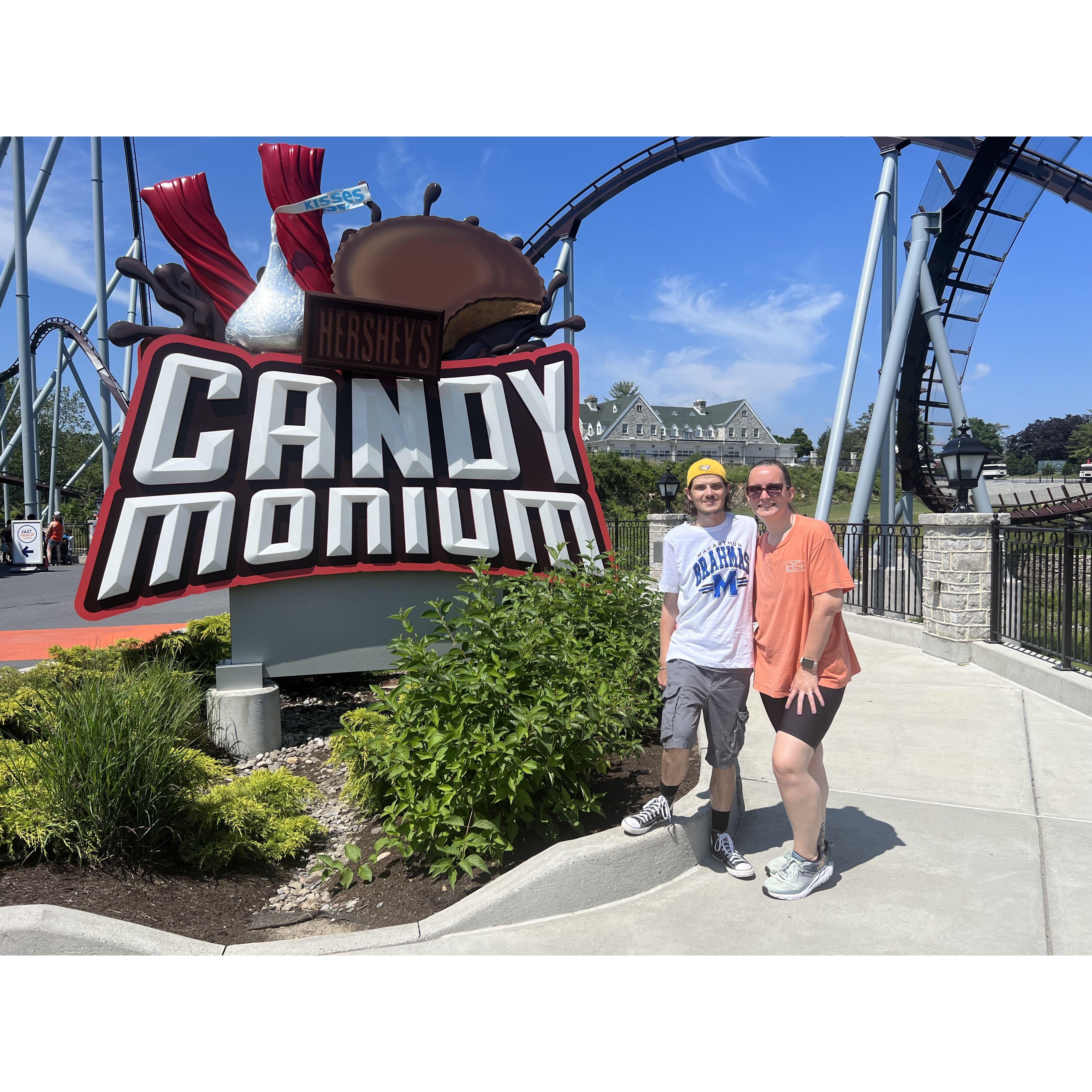 From our first trip together, outside the Candy Monium Roller Coaster, Hersheypark, PA.