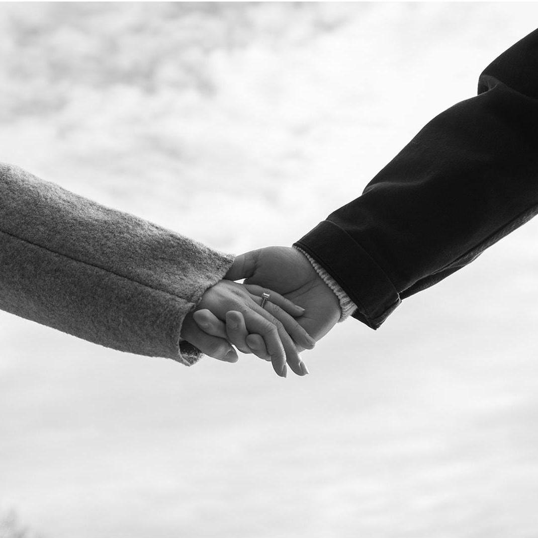 Hand in hand.