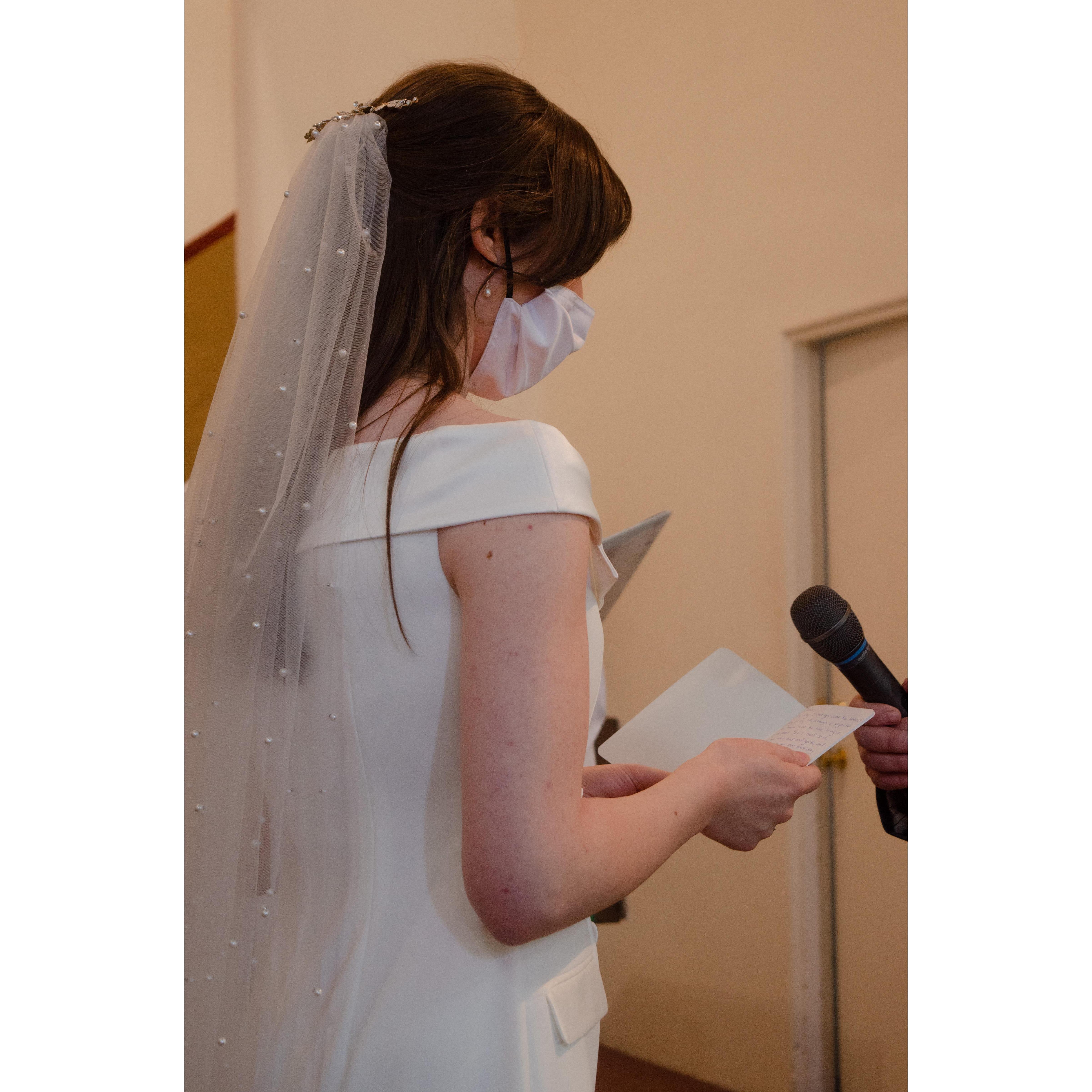 Maxine reading her vows.