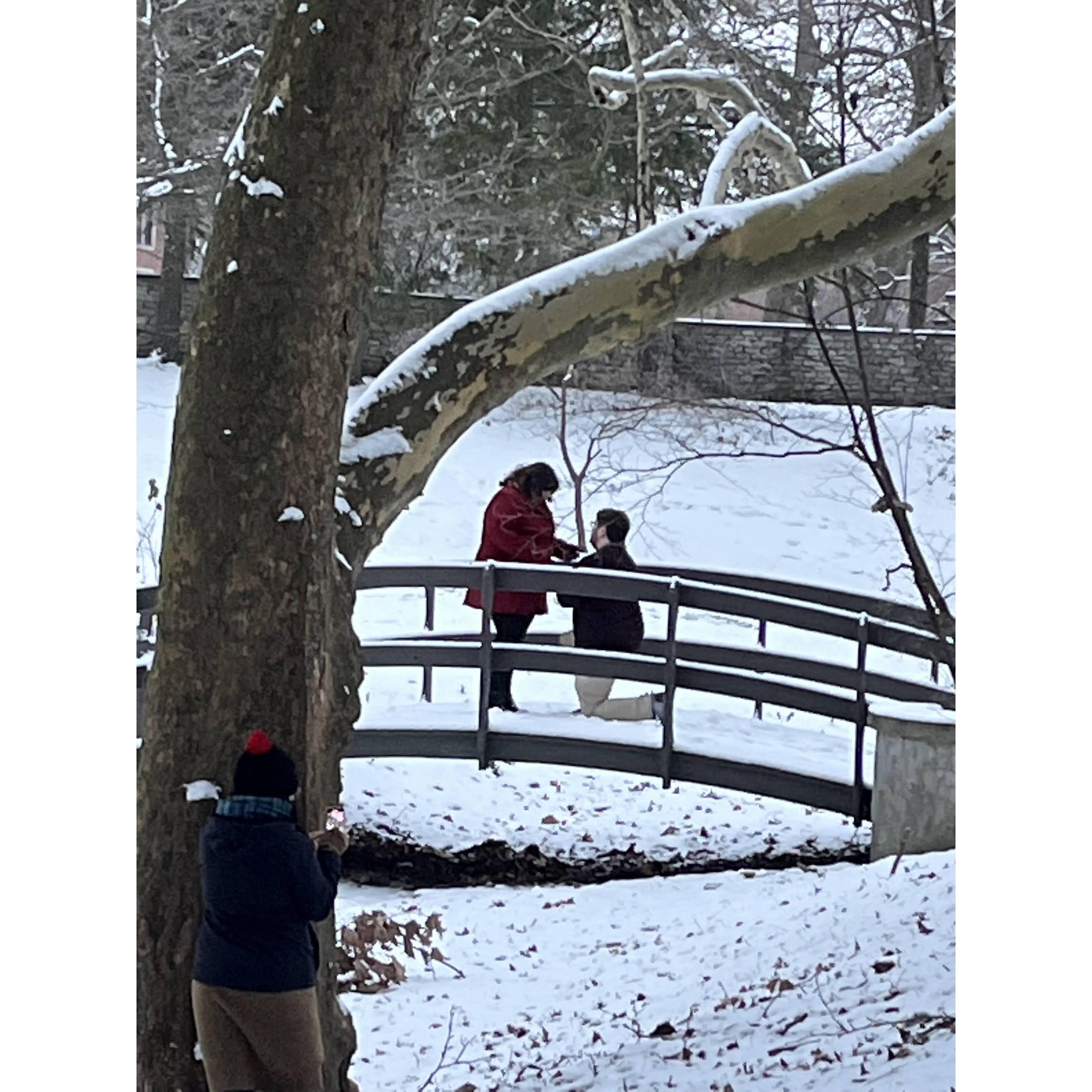 Our engagement! We're particularly fond of this photo, both for the great framing from our friend Cooper, but also the capture of the secret filmmaking from bridesmaid Natalie Michelle!