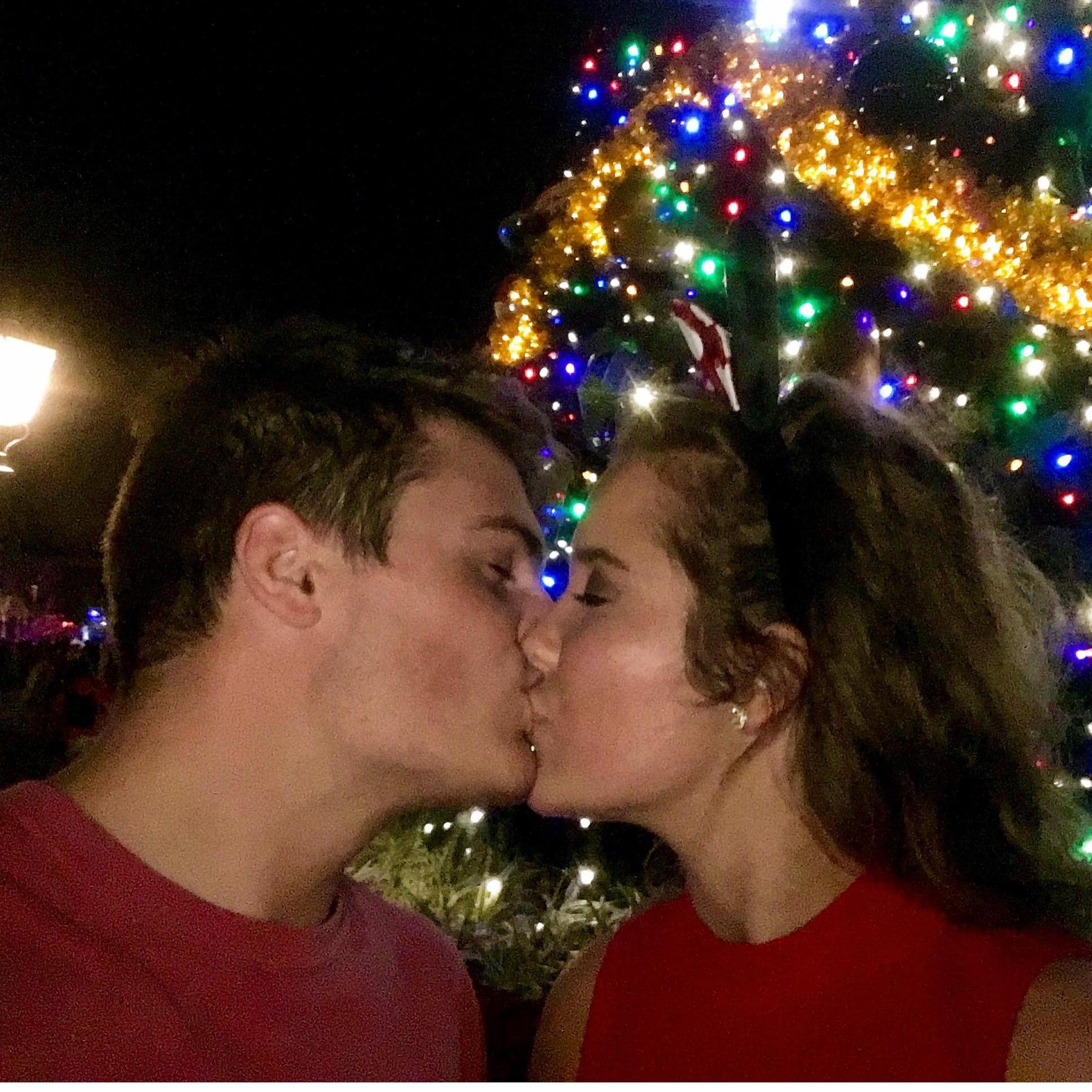 Kissing in front of Christmas trees must be our thing. This Christmas tree was special though as it was in DISNEY WORLD which was our favorite trip as a couple to date.