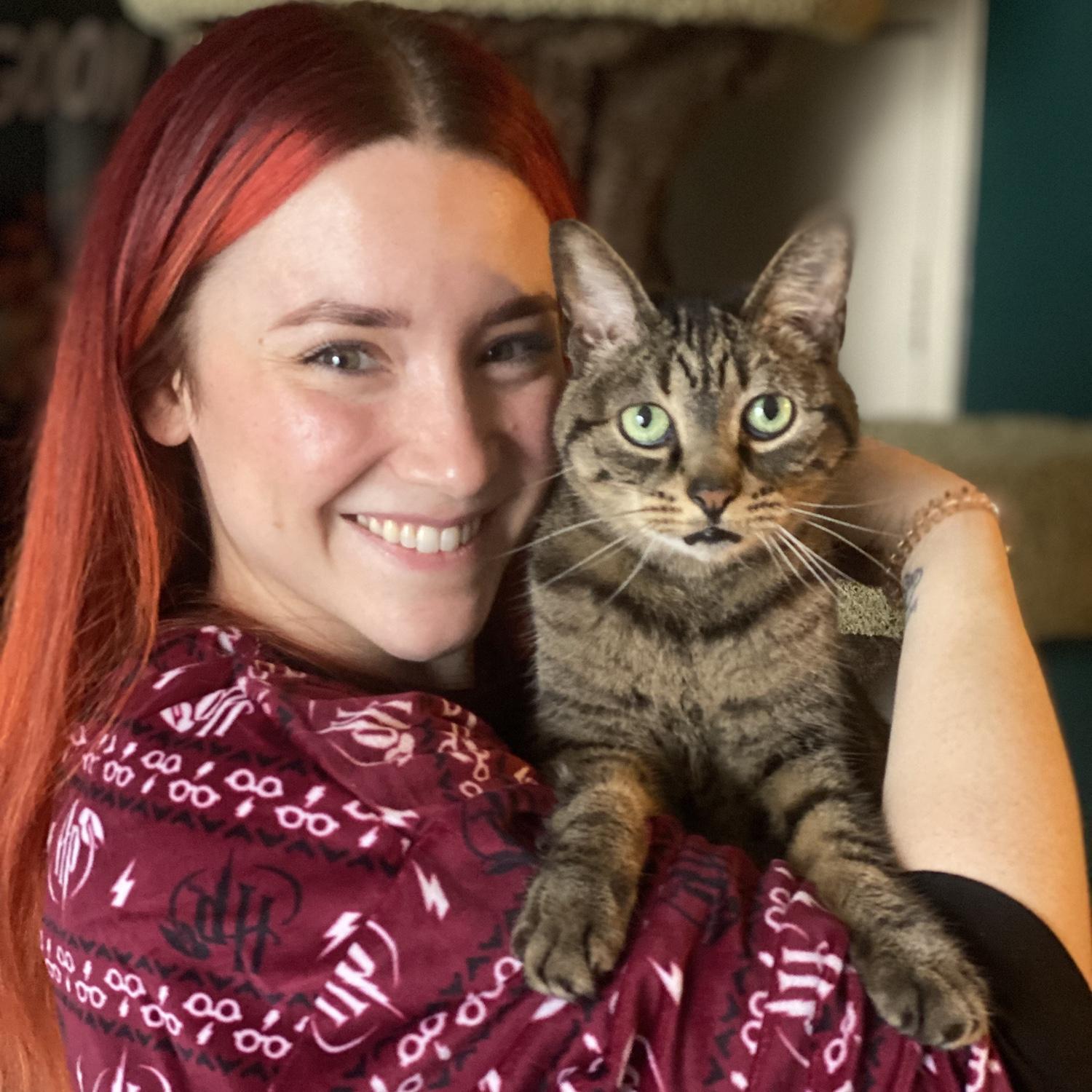 They love their fur baby Tiger Lilly! Candice adopted her as a kitten when she was in college. She's a handful, but will always be Candice's baby!